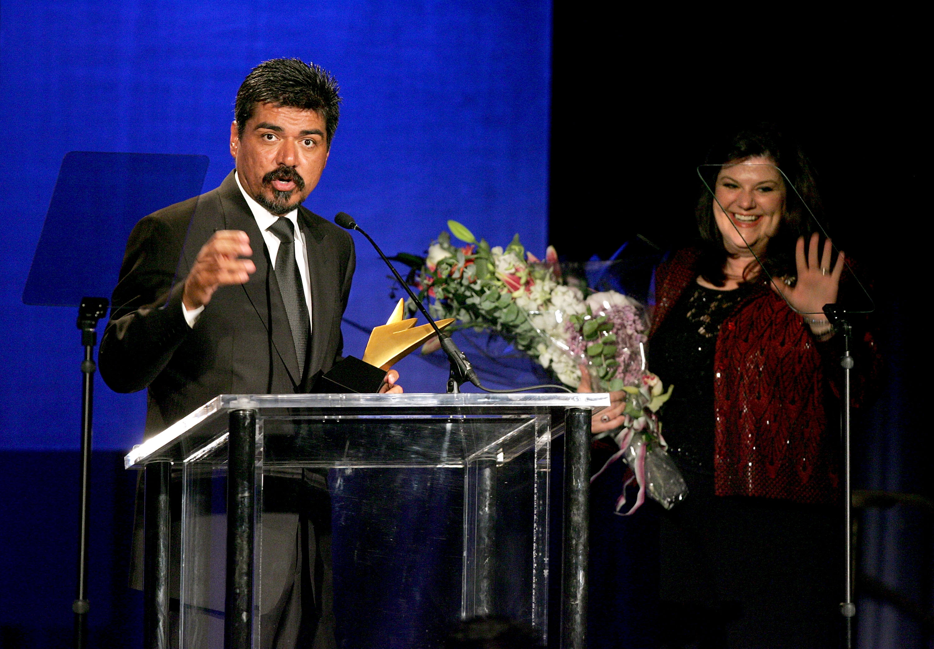 George Lopez and Ann Serrano accept the Hennessy Privilege Award onstage at the 20th Annual Imagen Awards Gala on June 17, 2005, in Beverly Hills, California. | Source: Getty Images