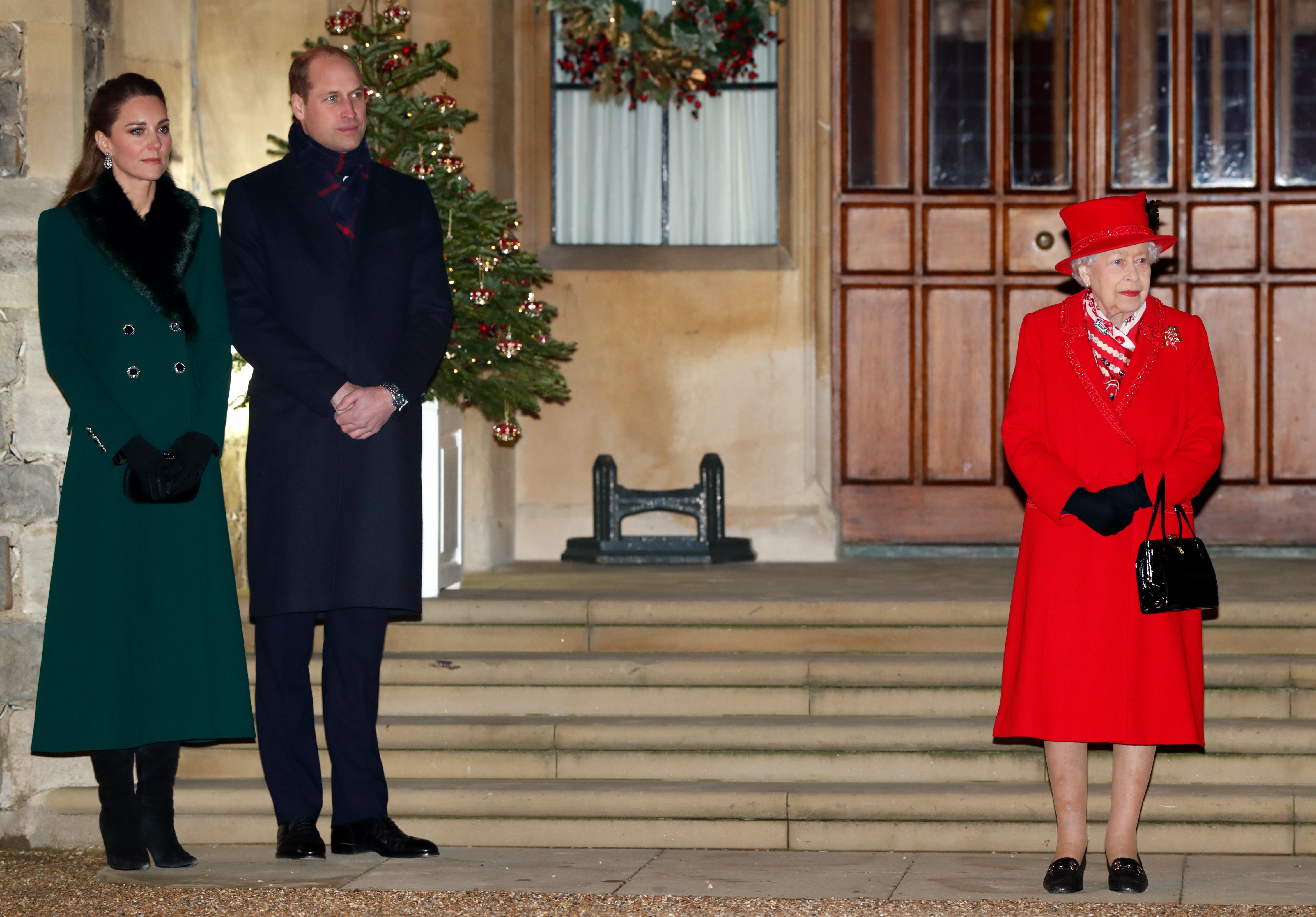 The Duke and Duchess of Cambridge stand with Queen Elizabeth in Windsor Castle while attending an event held on December 08, 2020 | Source: Getty Images