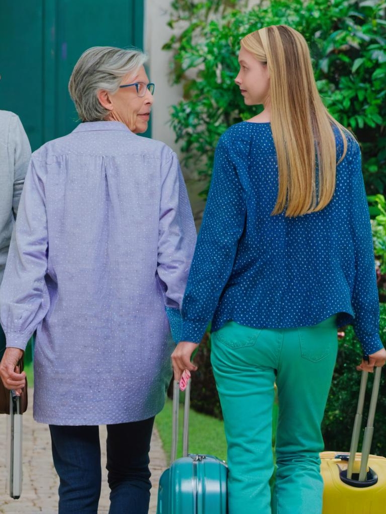 Brenda and her daughters leaving the house | Source: Midjourney