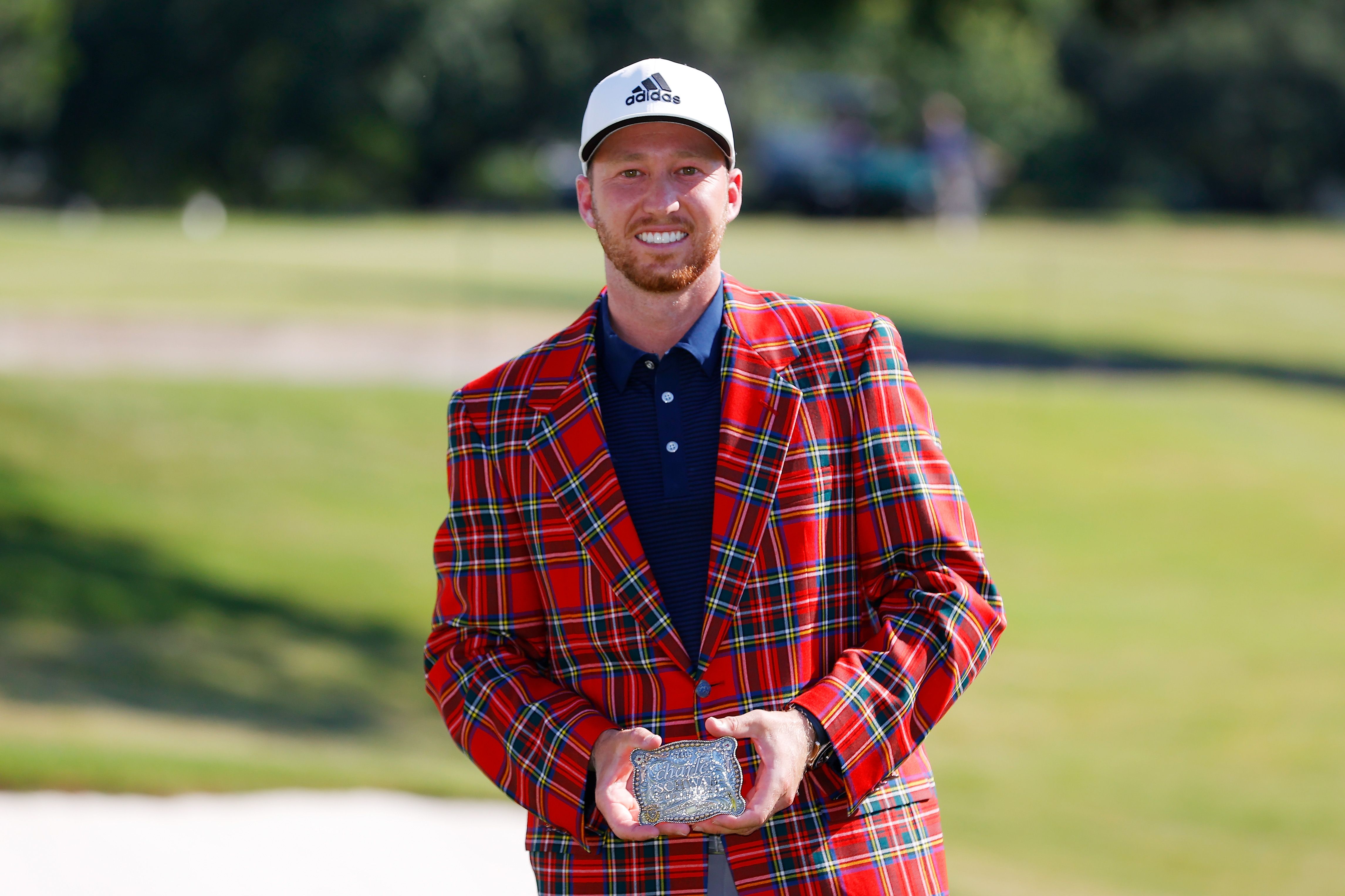  Daniel Berger with the plaid jacket and belt buckle after winning the Charles Schwab Challenge on June 14, 2020  | Source: Getty Images