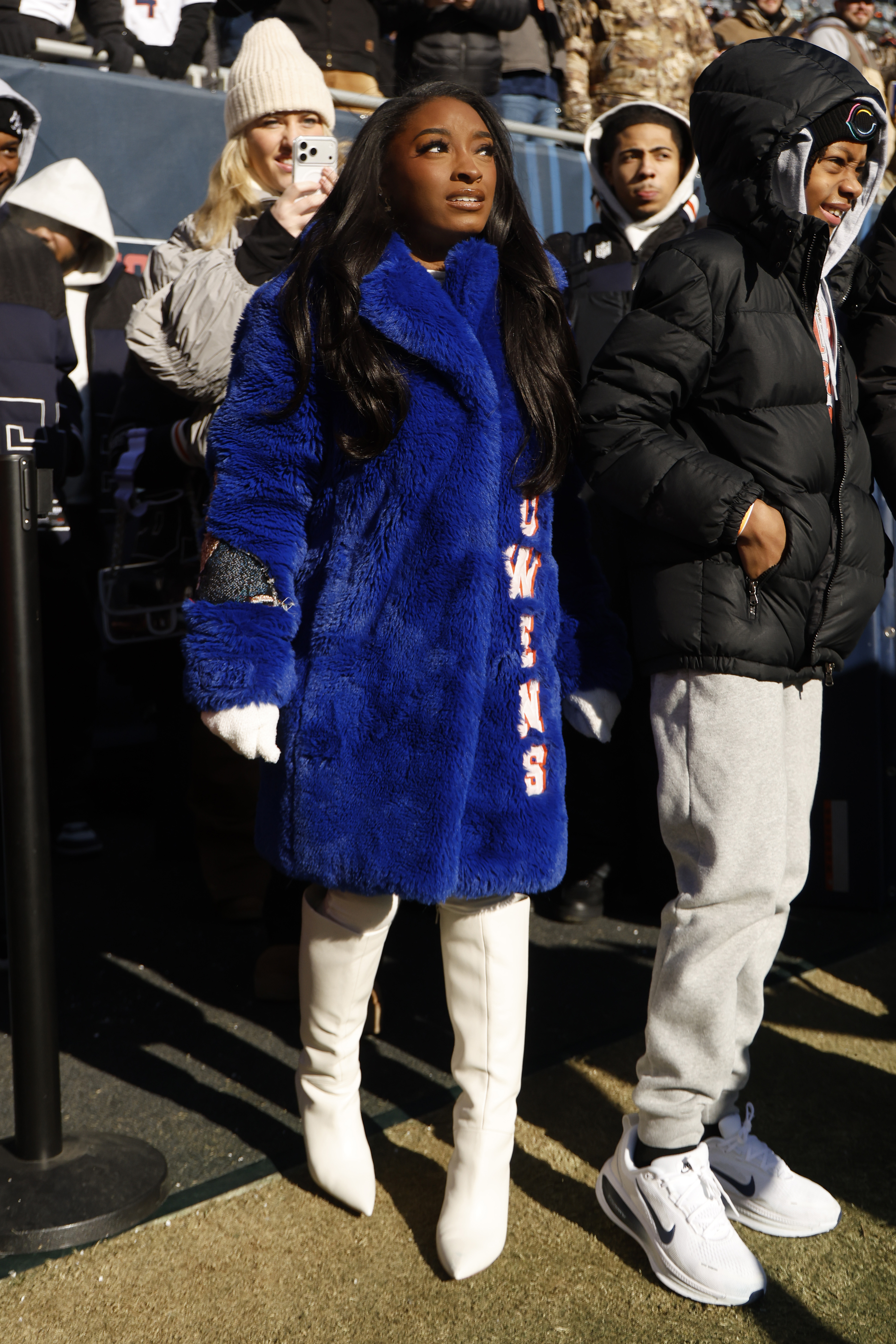 Simone Biles looks on during the game between the Cleveland Browns and the Chicago Bears in Illinois on December 14, 2025. | Source: Getty Images