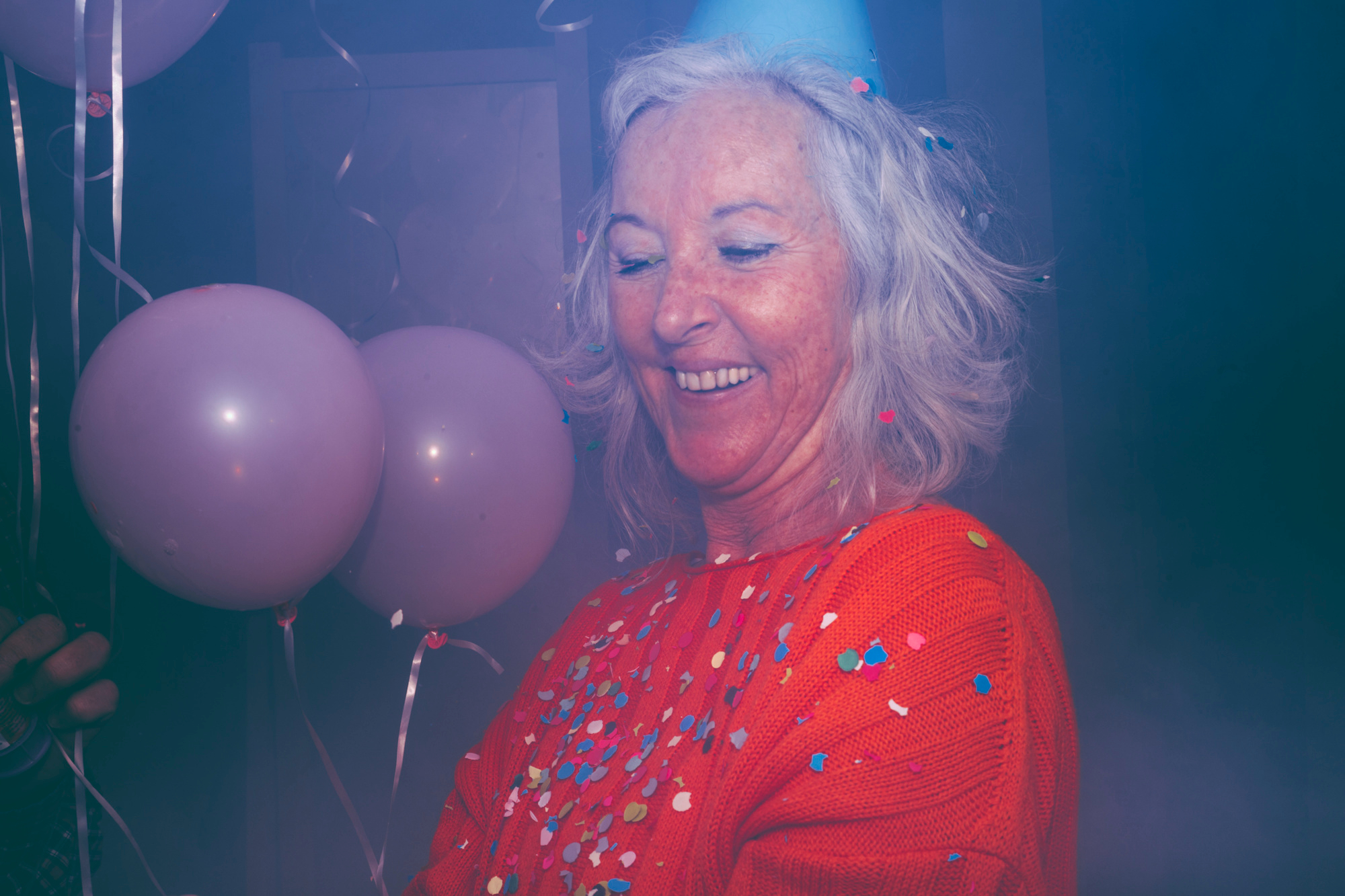 A happy woman at a party | Source: Pexels