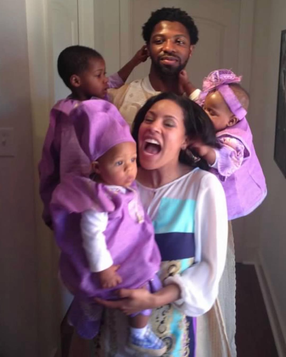 Sheinelle Jones and her husband Uche Ojeh take family photo with their children, from a post dated May 25, 2021. | Source: Instagram/sheinelle_o