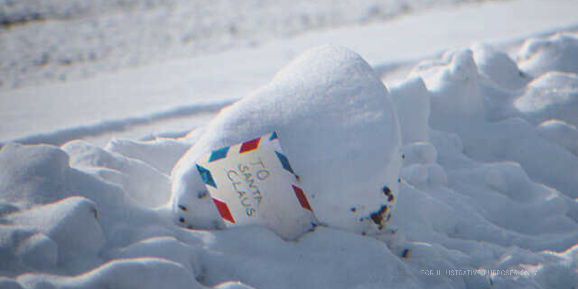 Letter in the snow. | Source: Shutterstock