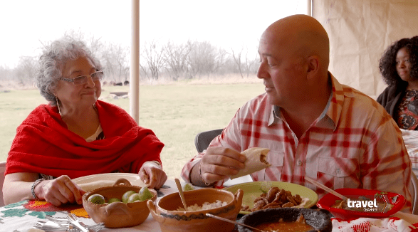 Andrew Zimmern in an episode of "Bizarre Foods" in 2017 | Photo: YouTube/Travel Channel
