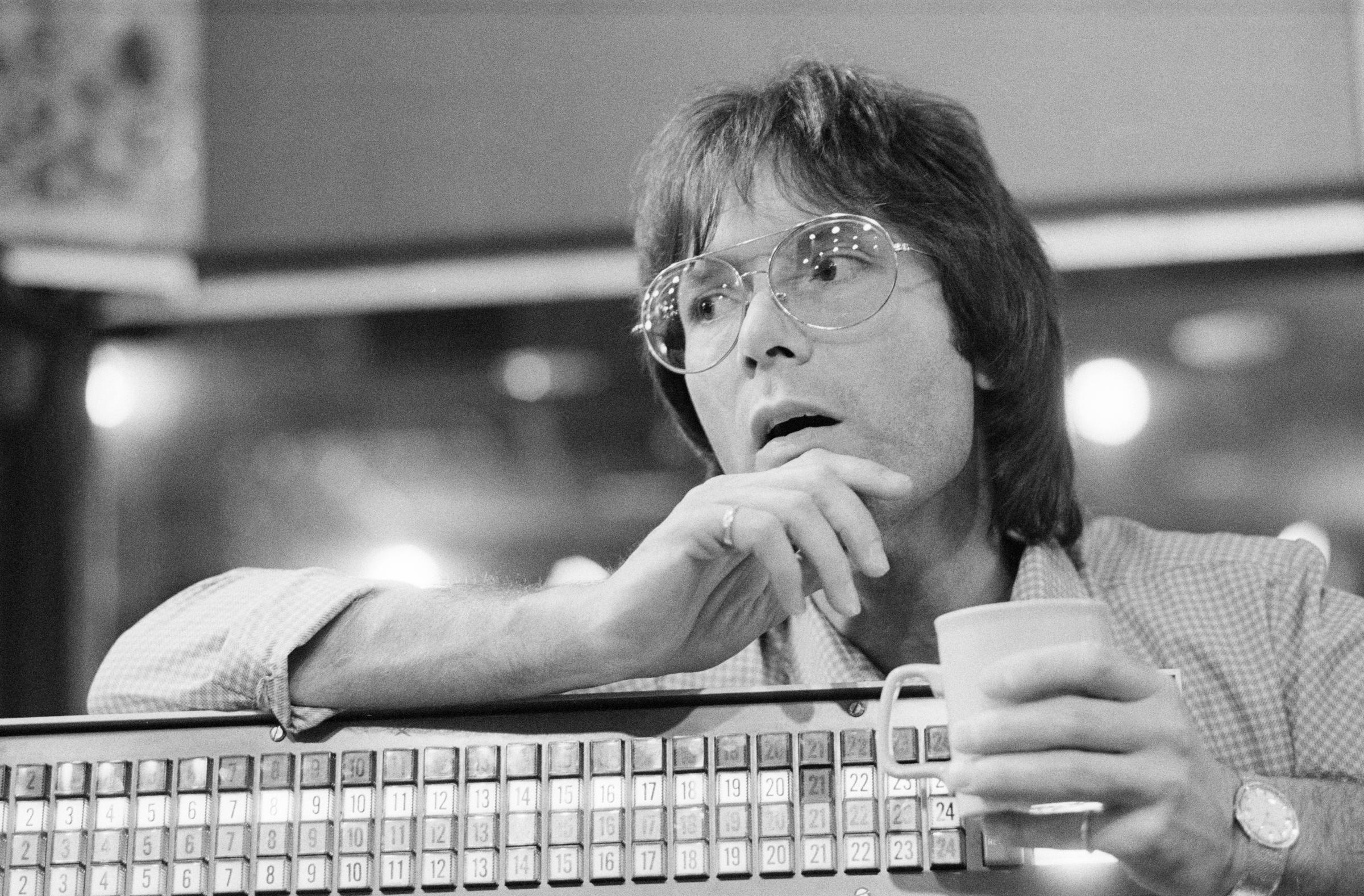 Sir Cliff Richard in a recording studio in October 1983. | Source: Getty Images