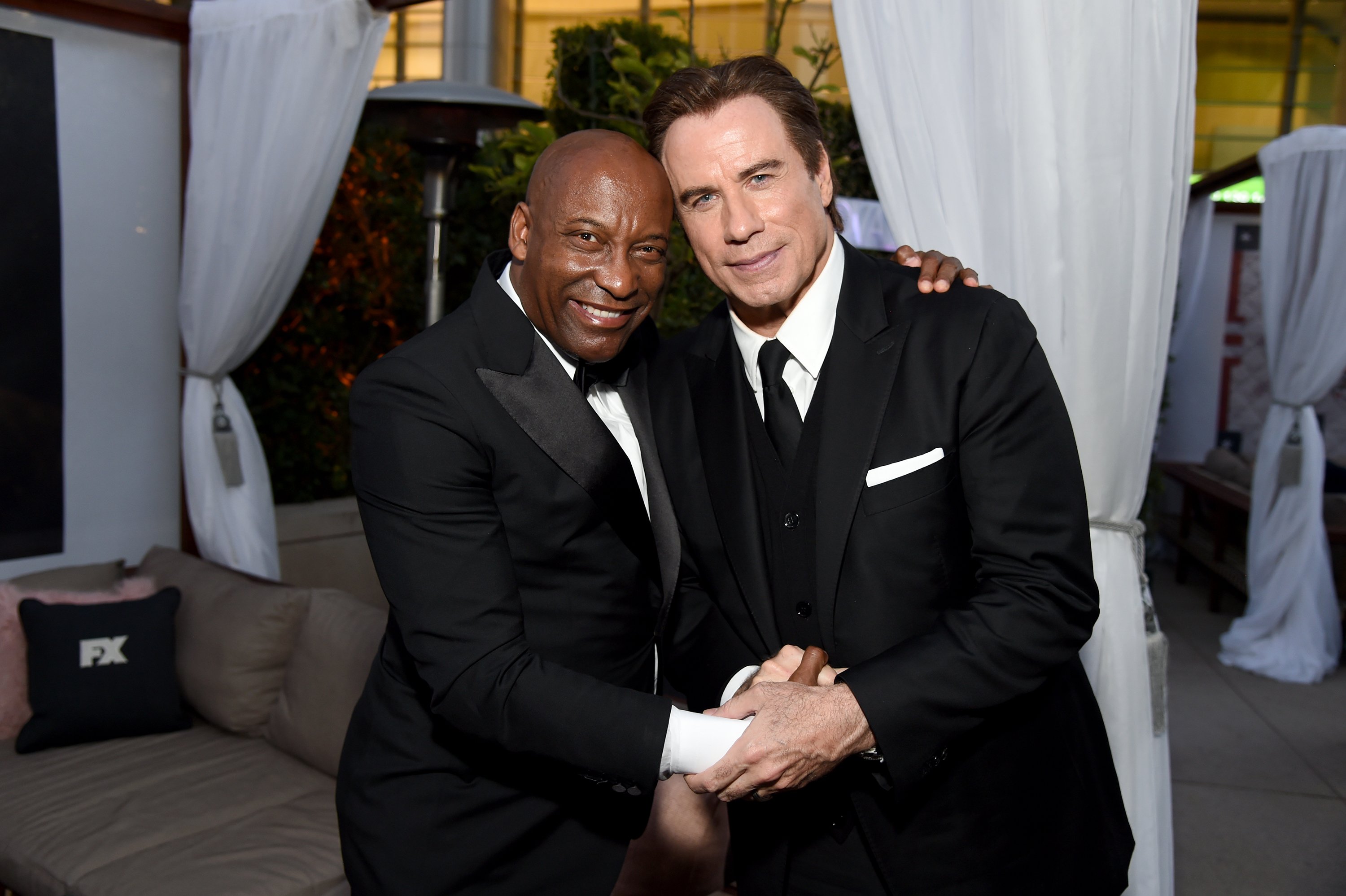 Director John Singleton and actor John Travolta at Vanity Fair And FX's Annual Primetime Emmy Nominations Party in 2016.Photo: Getty Images/GlobalImagesUkraine