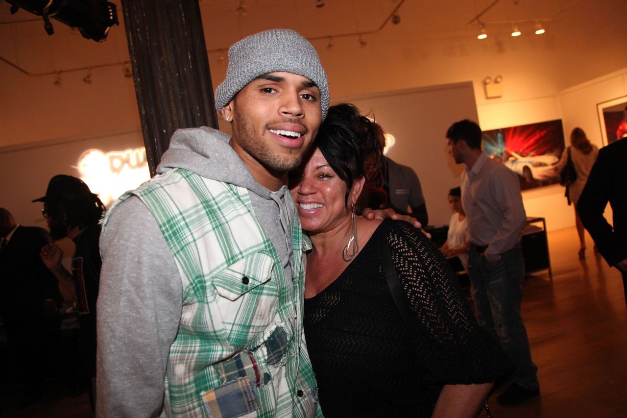 Chris Brown and Joyce Hawkins at the Dum English Exhibition Opening at Opera Gallery on June 11, 2012 in New York City. | Source: Getty Images