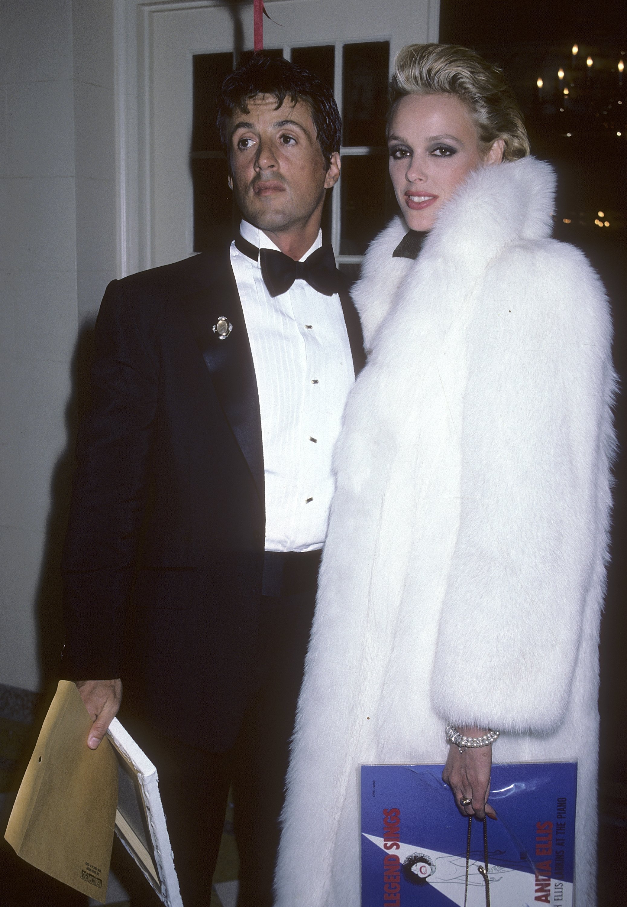 Sylvester Stallone and Brigitte Nielsen at a cocktail party hosted in their honor on February 13, 1986 | Source: Getty Images
