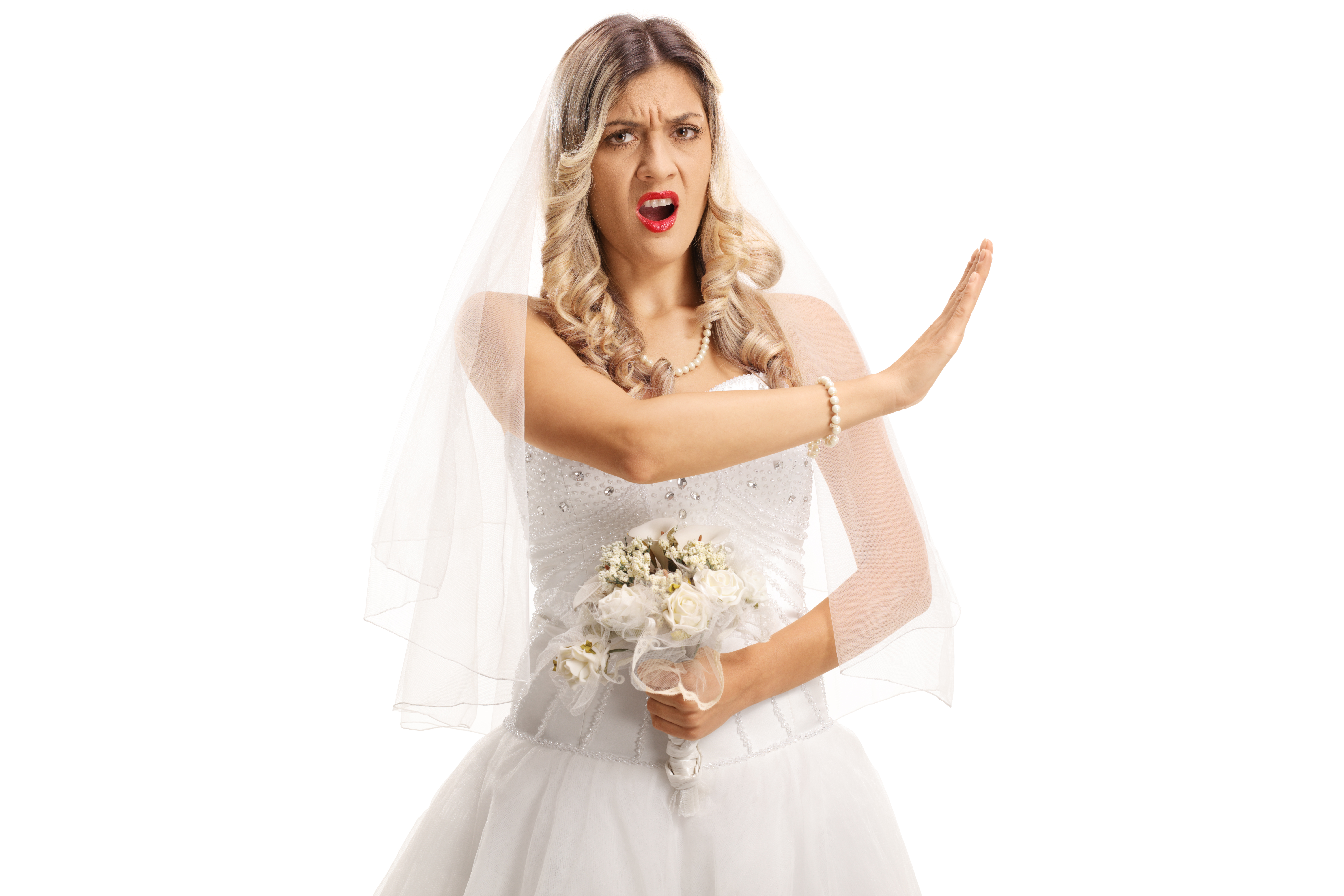 An angry bride showing someone to stop | Source: Shutterstock