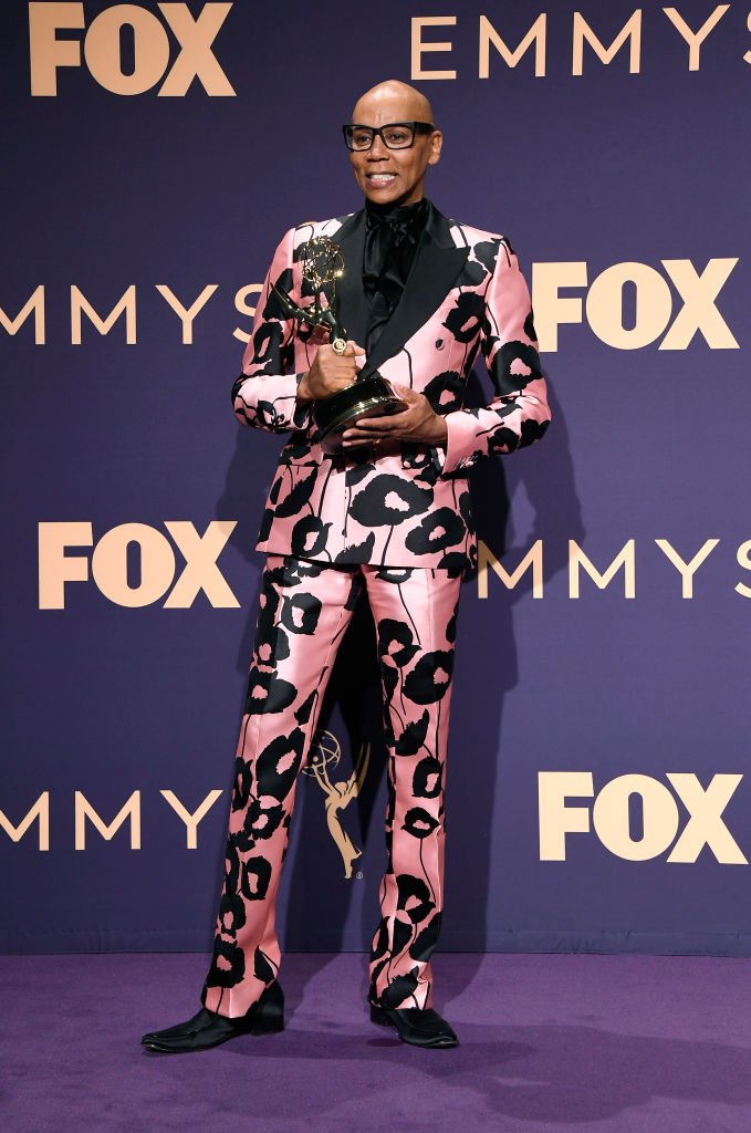 RuPaul poses with award for Outstanding Competition Program in the press room during the 71st Emmy Awards at Microsoft Theater | Getty Images