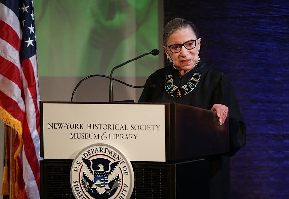 U.S. Supreme Court Justice Ruth Bader Ginsburg prepares to administer the Oath of Allegiance to candidates for U.S. citizenship | Photo: Getty Images