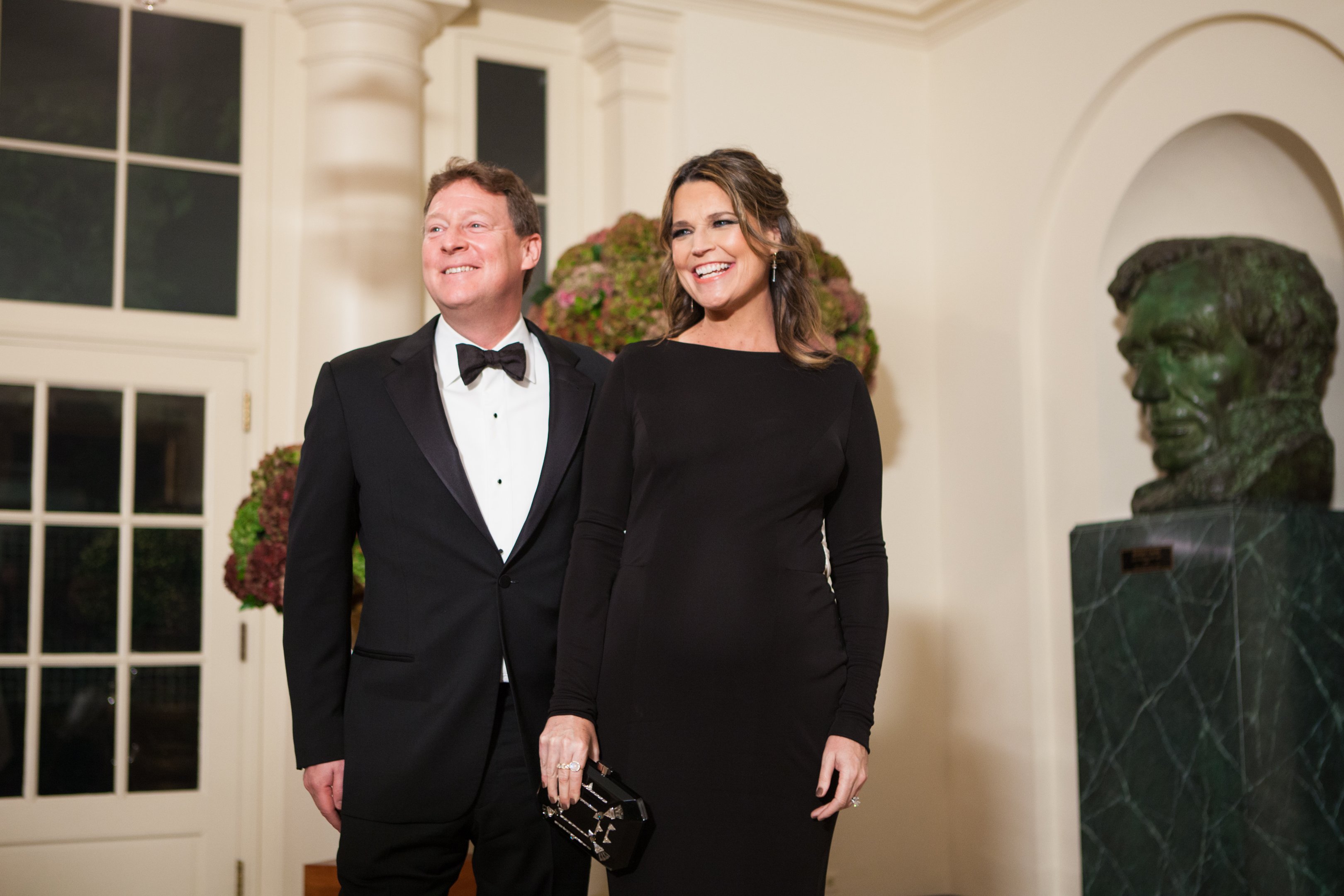 Savannah Guthrie and her husband Michael Feldman, arrive at the White House in Washington, DC, USA on 18 October 2016 | Photo: Getty Images