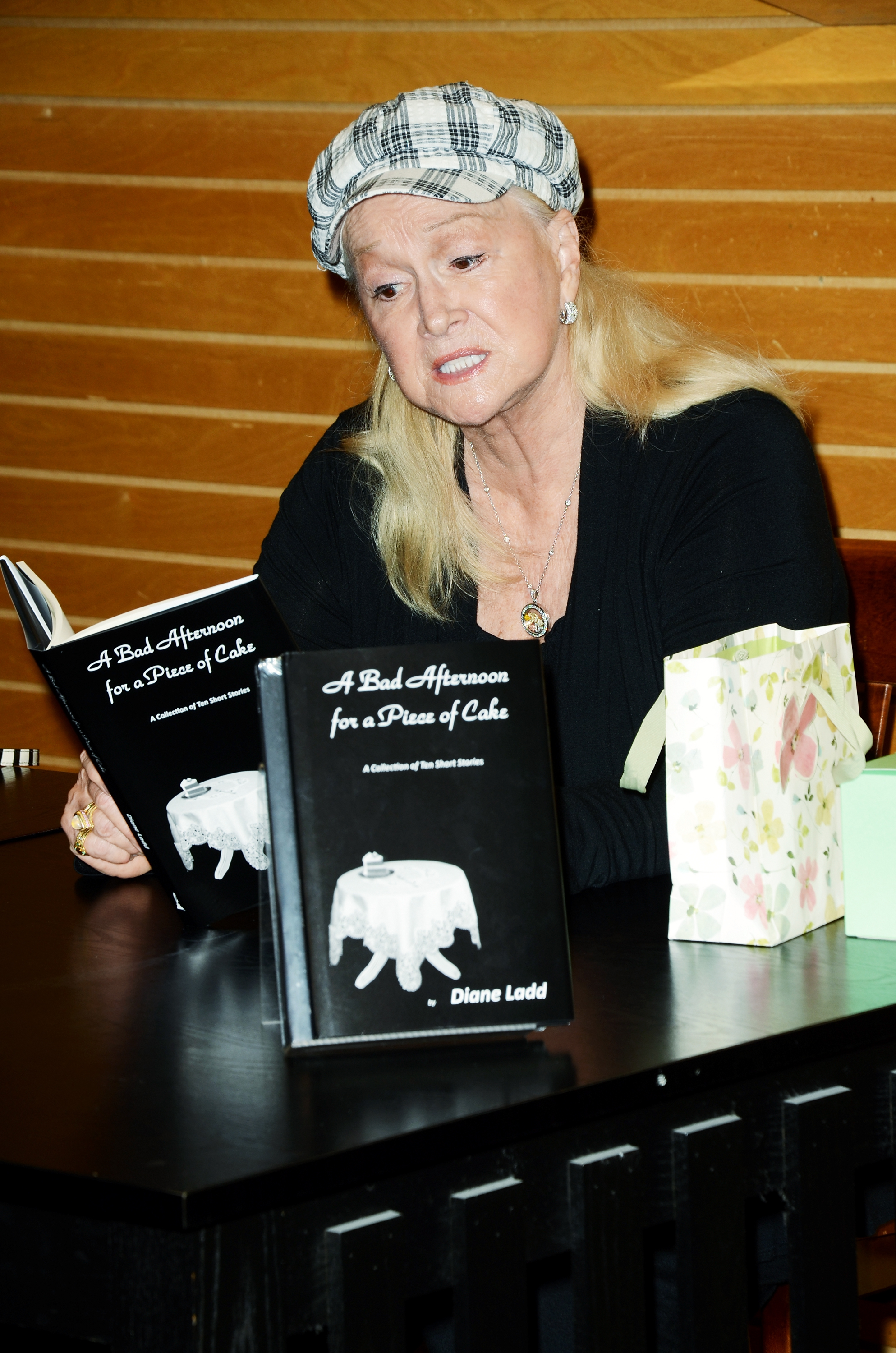 Diane Ladd signs copies of her new book "A Bad Afternoon For A Piece Of Cake" in Santa Monica, California on May 11, 2013. | Source: Getty Images