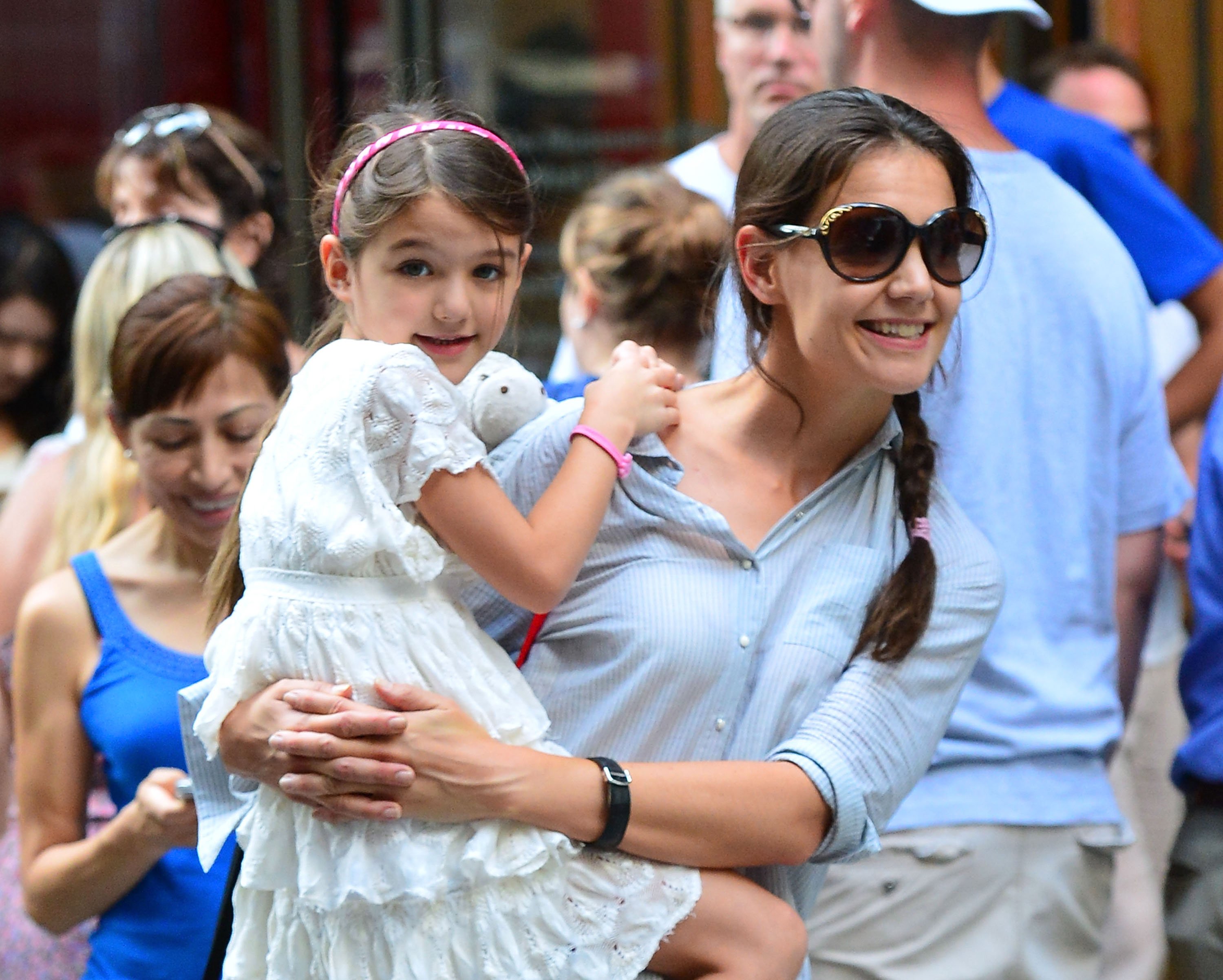 Katie Holmes and Suri outside the Museum of Modern Art in New York City in 2012. | Source: Getty Images