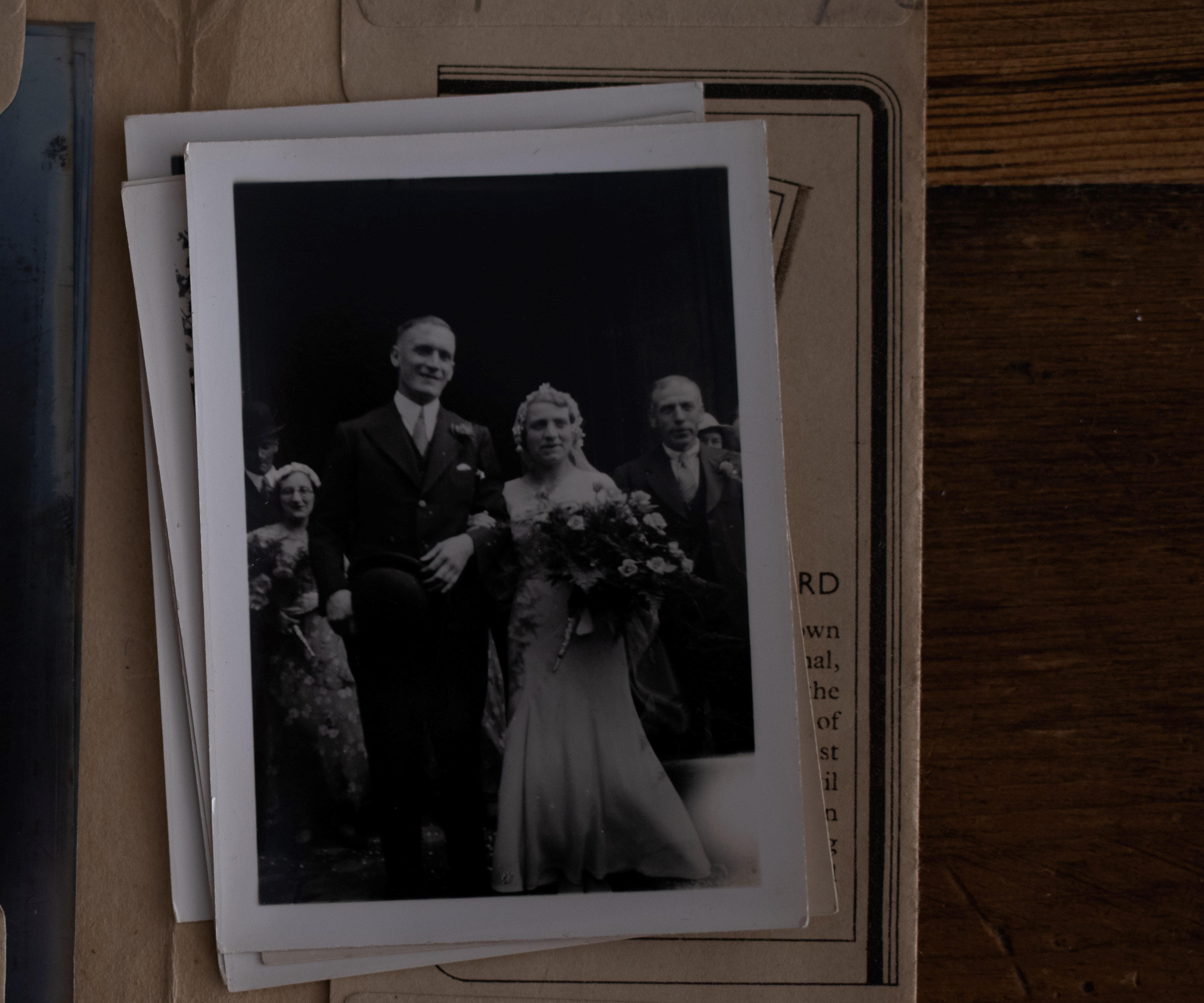 A month later, OP found another old picture of their dad with an unknown woman in a bridal gown | Source: Unsplash 