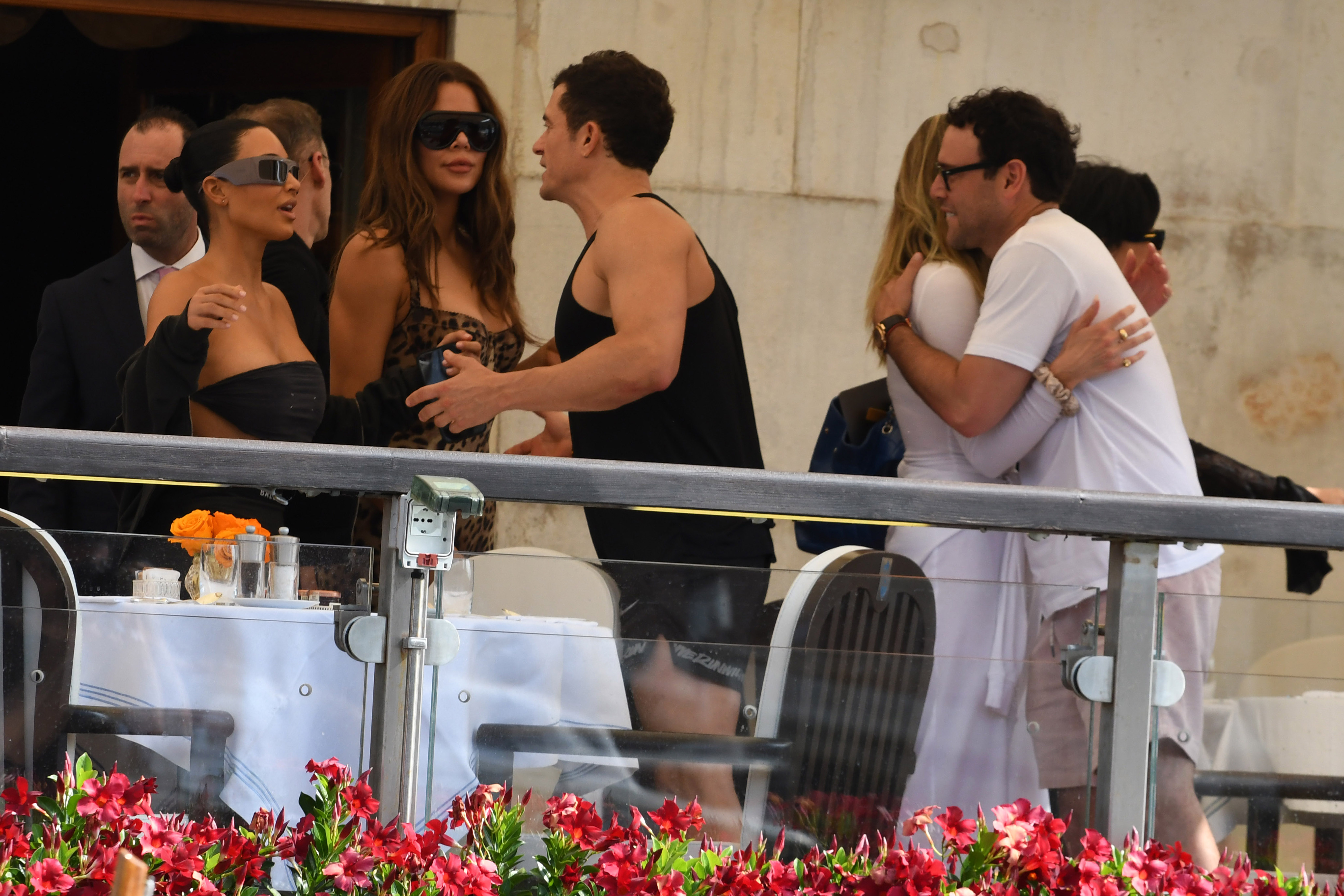 Kim Kardashian, Khloé Kardashian, and Orlando Bloom ahead of Jeff Bezos and Lauren Sanchez Wedding on June 26, 2025 in Venice, Italy. (Photo by Luigi Iorio/GC Images)meet ahead of Jeff Bezos and Lauren Sanchez Wedding on June 26, 2025 in Venice, Italy | Source: Getty Images