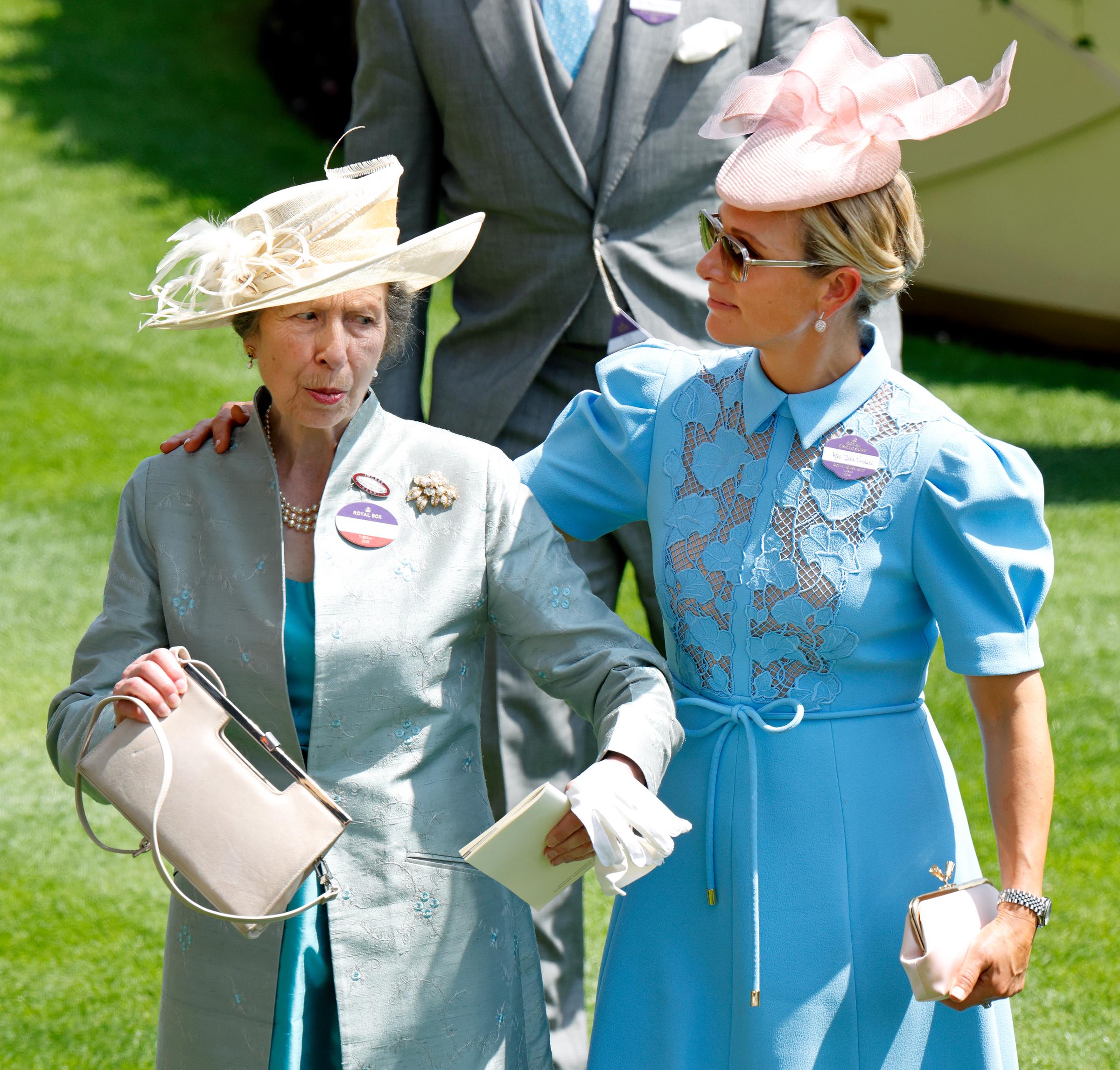 Zara Tindall embraces her mother Princess Anne, Princess Royal, as they attend day one of Royal Ascot at Ascot Racecourse on 17 June 2025 in Ascot, England. | Source: Getty Images