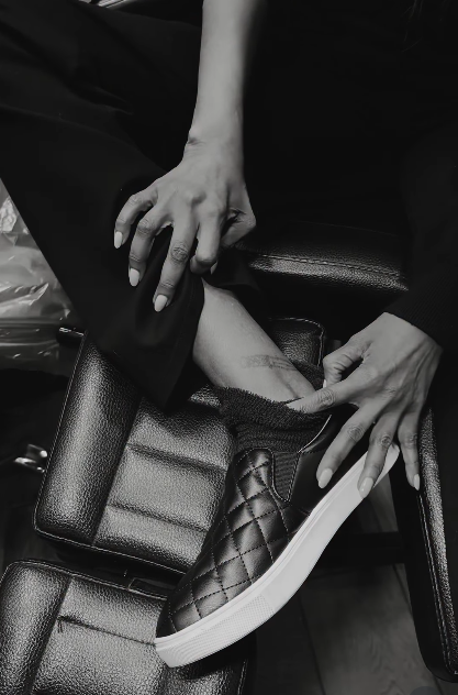 Iman showing an old tattoo near her ankle, from a video dated January 10, 2026 | Source: Instagram/the_real_iman