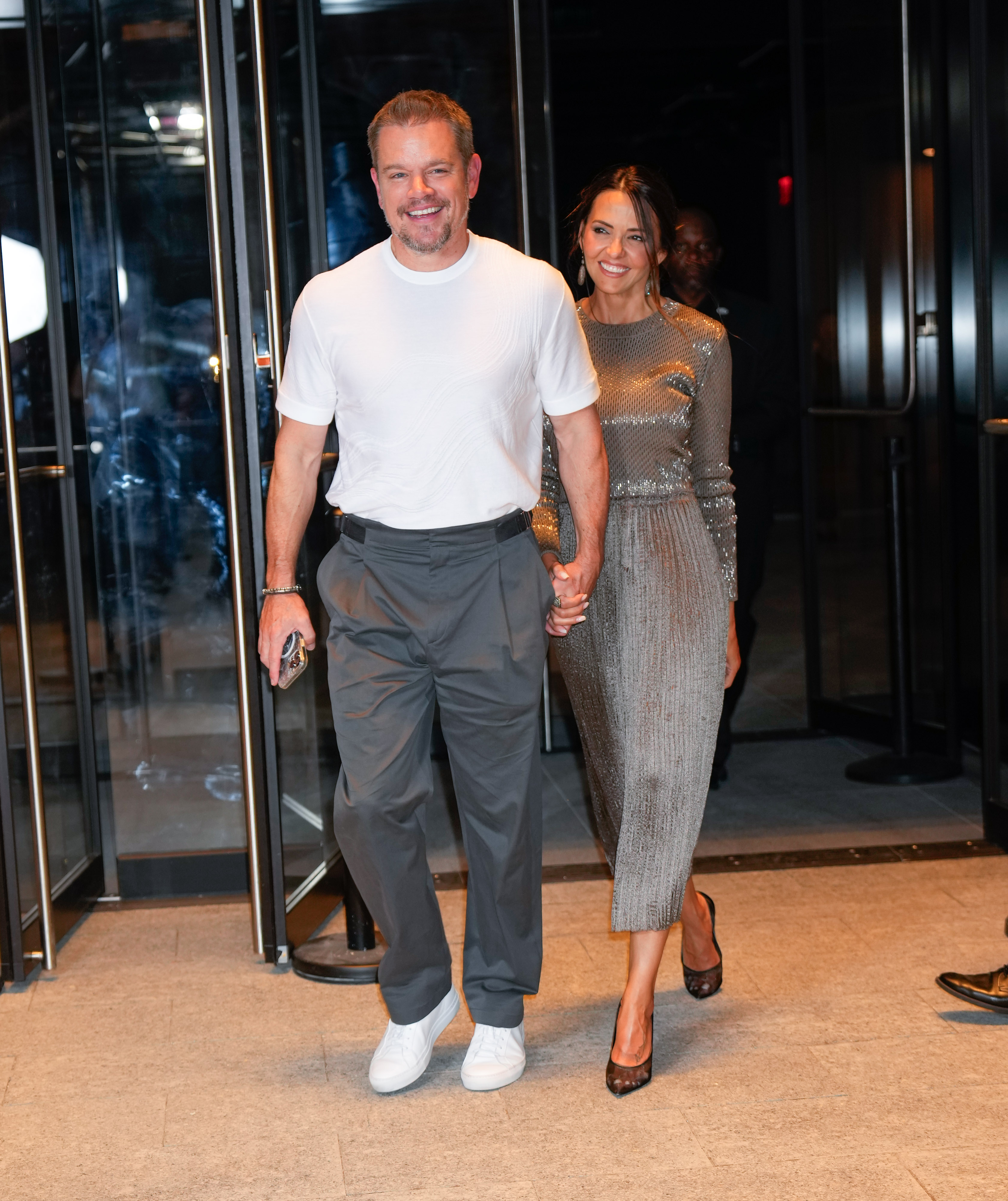 Matt Damon and Luciana Barroso pictured coming out of the Hermes fashion show on September 14, 2023 in New York City | Source: Getty Images
