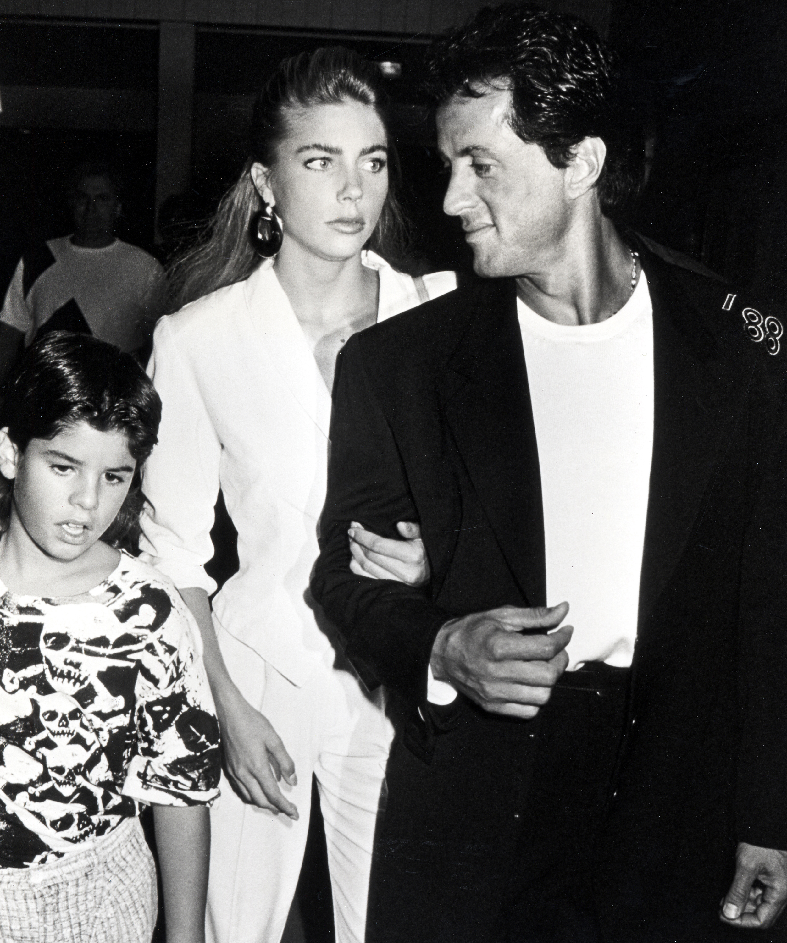 Jennifer Flavin, Sylvester and Sage Stallone on August 26, 1988 | Source: Getty Images