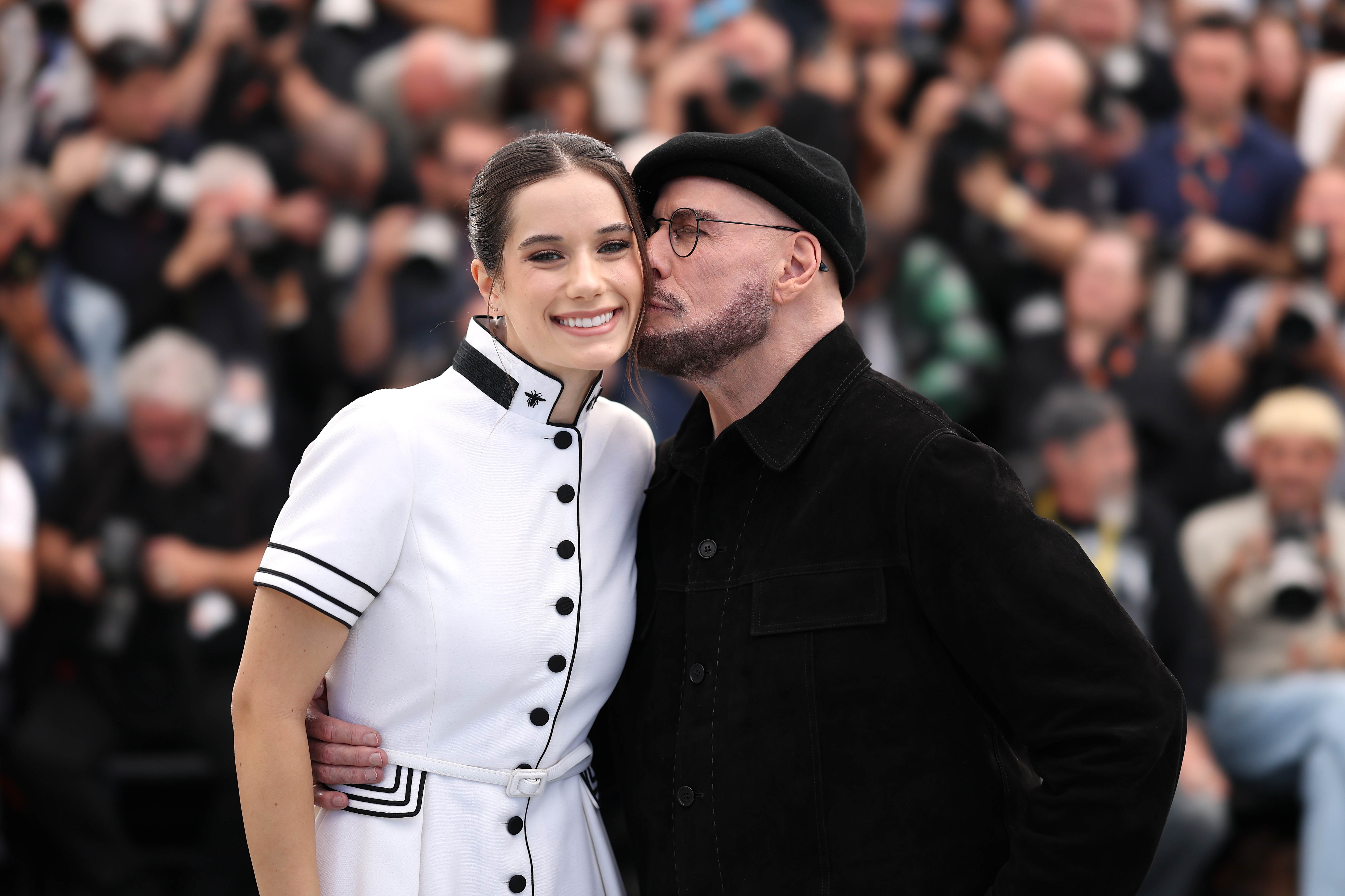 John and Ella Bleu Travolta attend the Official Cannes Film Festival Photocall for the Apple Original Film "Propeller One-Way Night Coach" at the rooftop of the Palais des Festival on May 16, 2026 in Cannes, France. | Source: Getty Images
