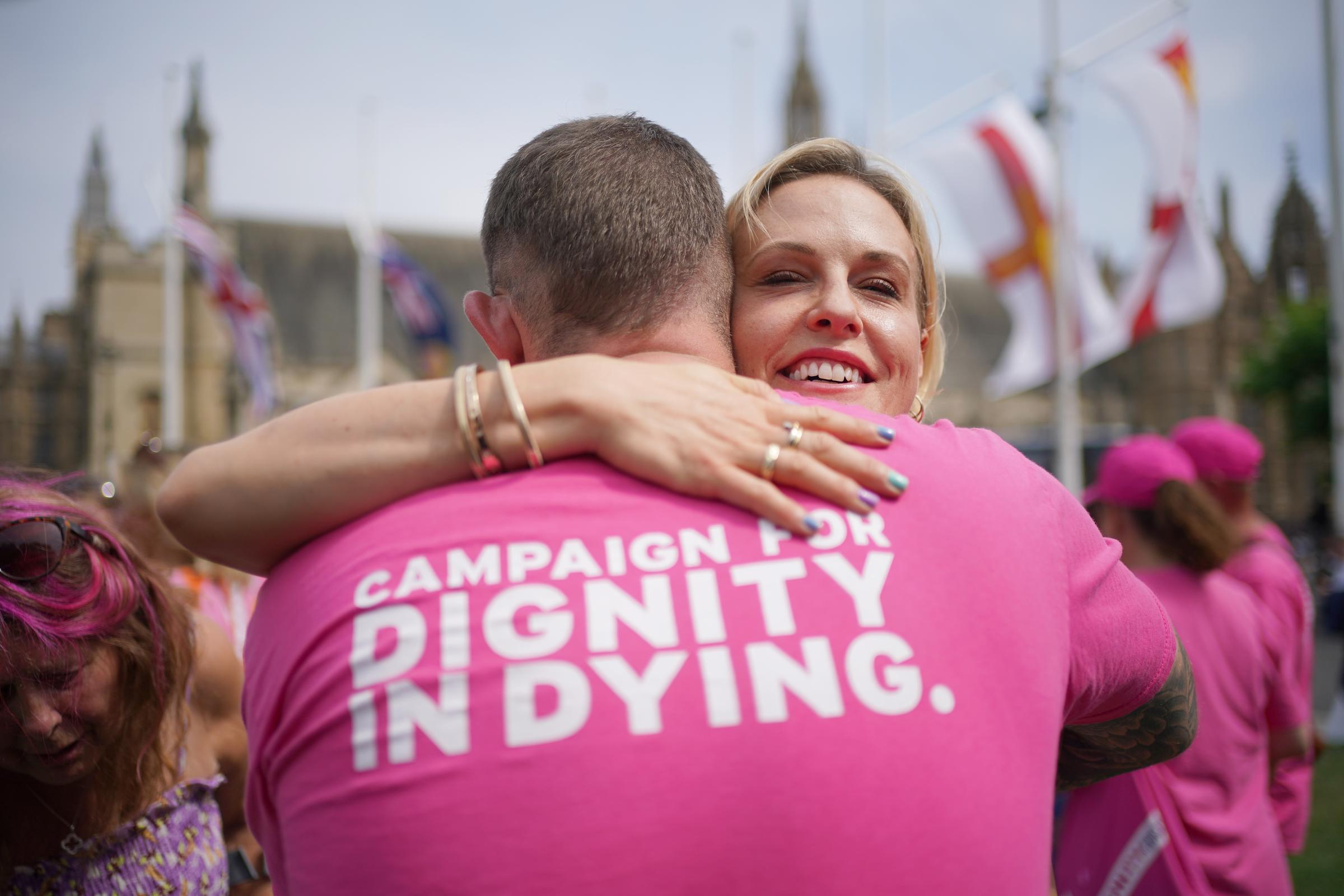 Dame Esther Rantzen's daughter, Rebecca Wilcox, celebrates with a Dignity in Dying campaigner in London, England, after the Terminally Ill Adults (End of Life) Bill was passed in the House of Commons on June 20, 2025. | Source: Getty Images