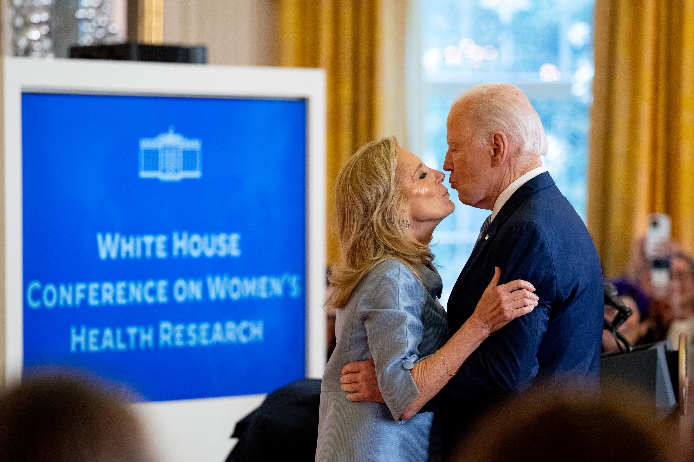 Jill and Joe Biden sharing a kiss during the first White House conference on women's health research in the East Room on December 11, 2024, in Washington, D.C. | Source: Getty Images