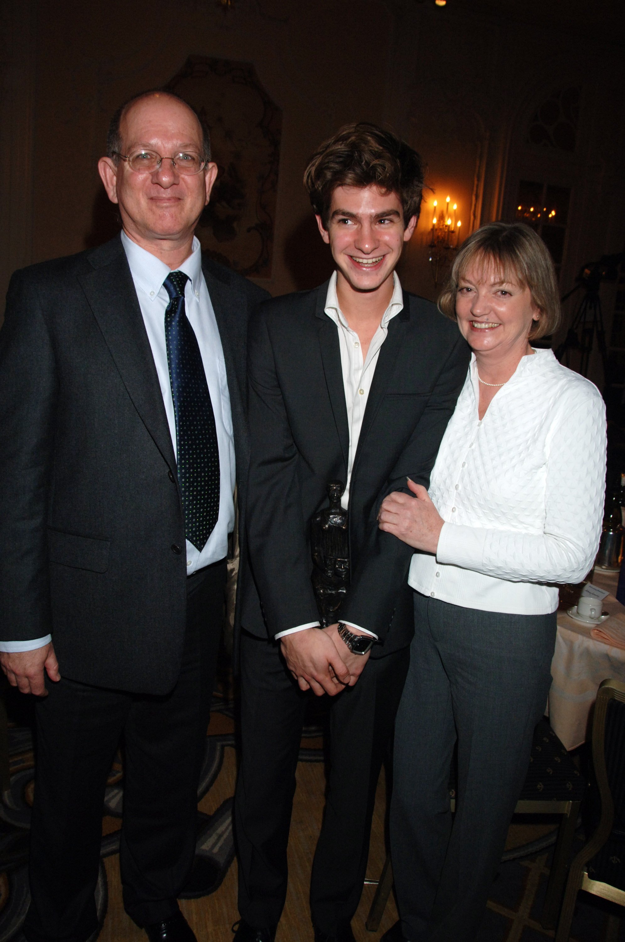 Richard Garfield, Andrew Garfield, and Lynn Garfield at the Evening Standard Theatre Awards on November 27, 2006, in London | Source: Getty Images