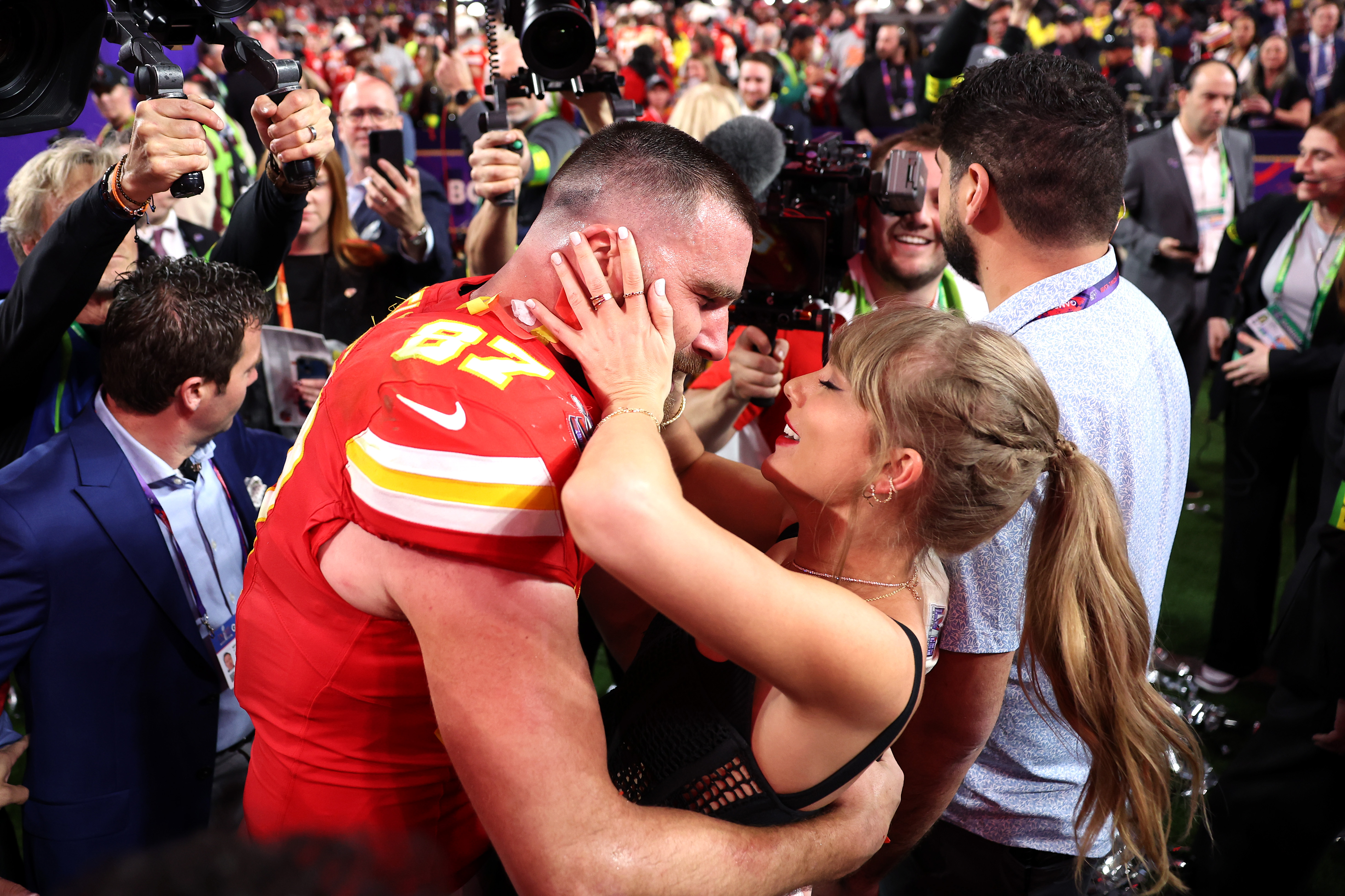 Travis Kelce of the Kansas City Chiefs celebrates with Taylor Swift after defeating the San Francisco 49ers 25-22 in overtime during Super Bowl LVIII at Allegiant Stadium in Las Vegas, Nevada, on February 11, 2024 | Source: Getty Images