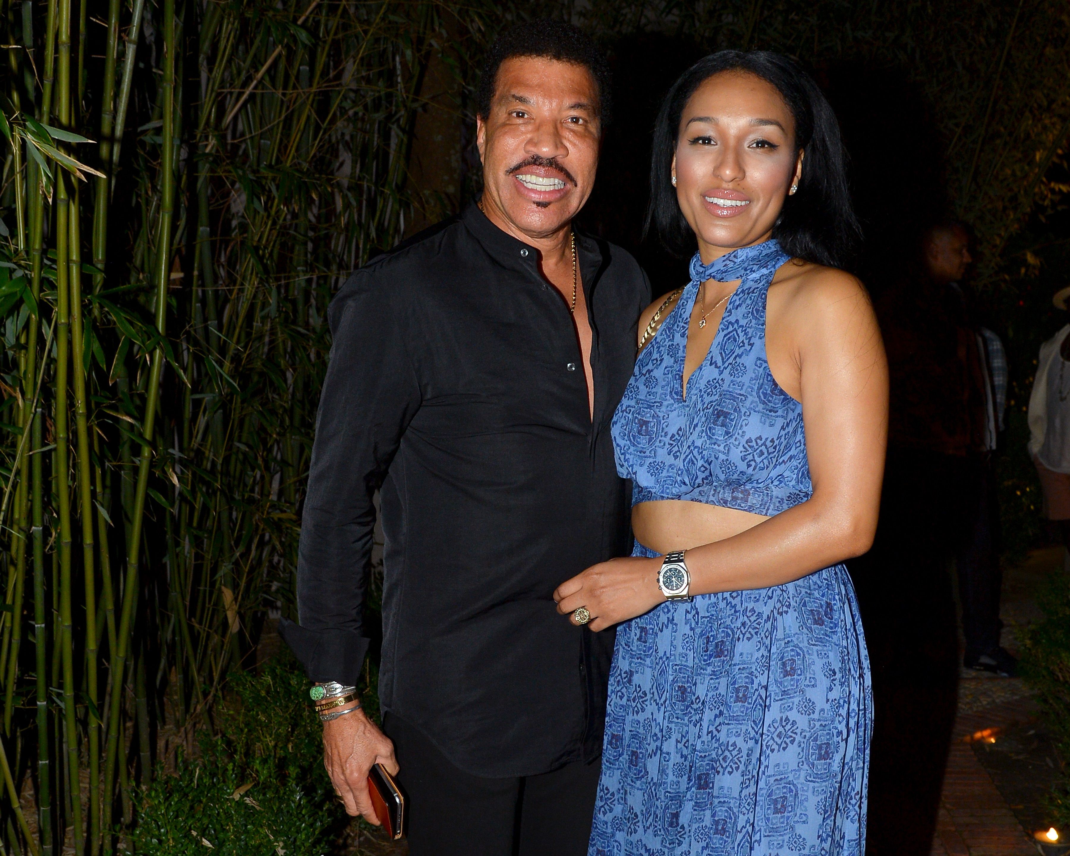 Lionel Richie and Lisa Parigi attend the Apollo in the Hamptons 2016 party at The Creeks on August 20, 2016 in East Hampton, New York. | Source: Getty Images
