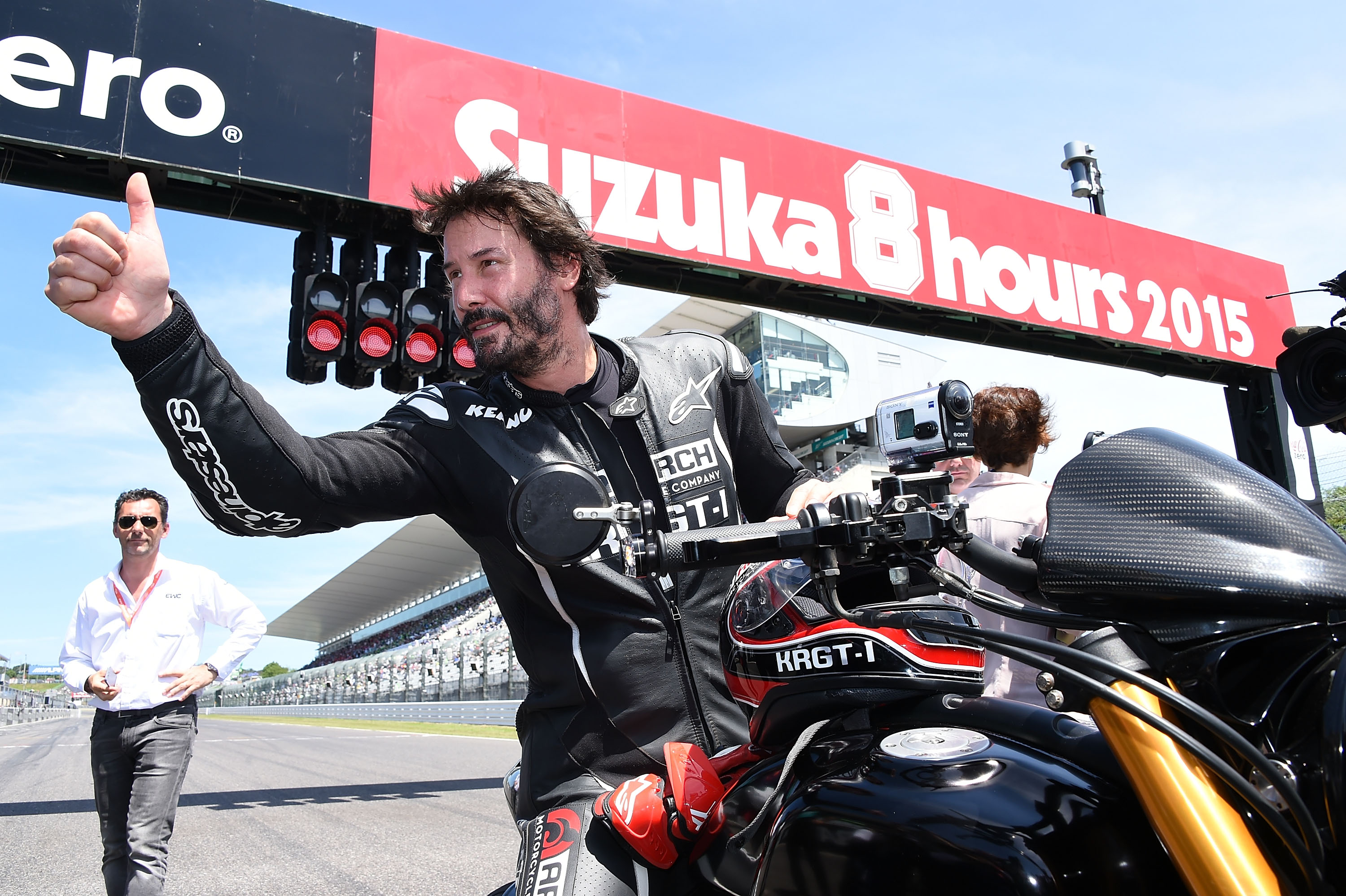 Keanu Reeves is seen during the opening ceremony of the Suzuka 8 Hours at the Suzuka Circuit in Japan, on July 26, 2015 | Source: Getty Images