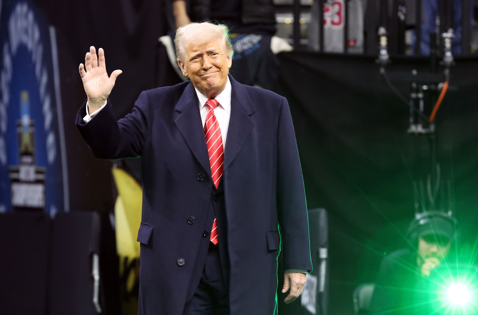 President Donald Trump waves while entering the arena during the NCAA Division I Wrestling Championships on March 22, 2025, in Philadelphia, Pennsylvania | Source: Getty Images