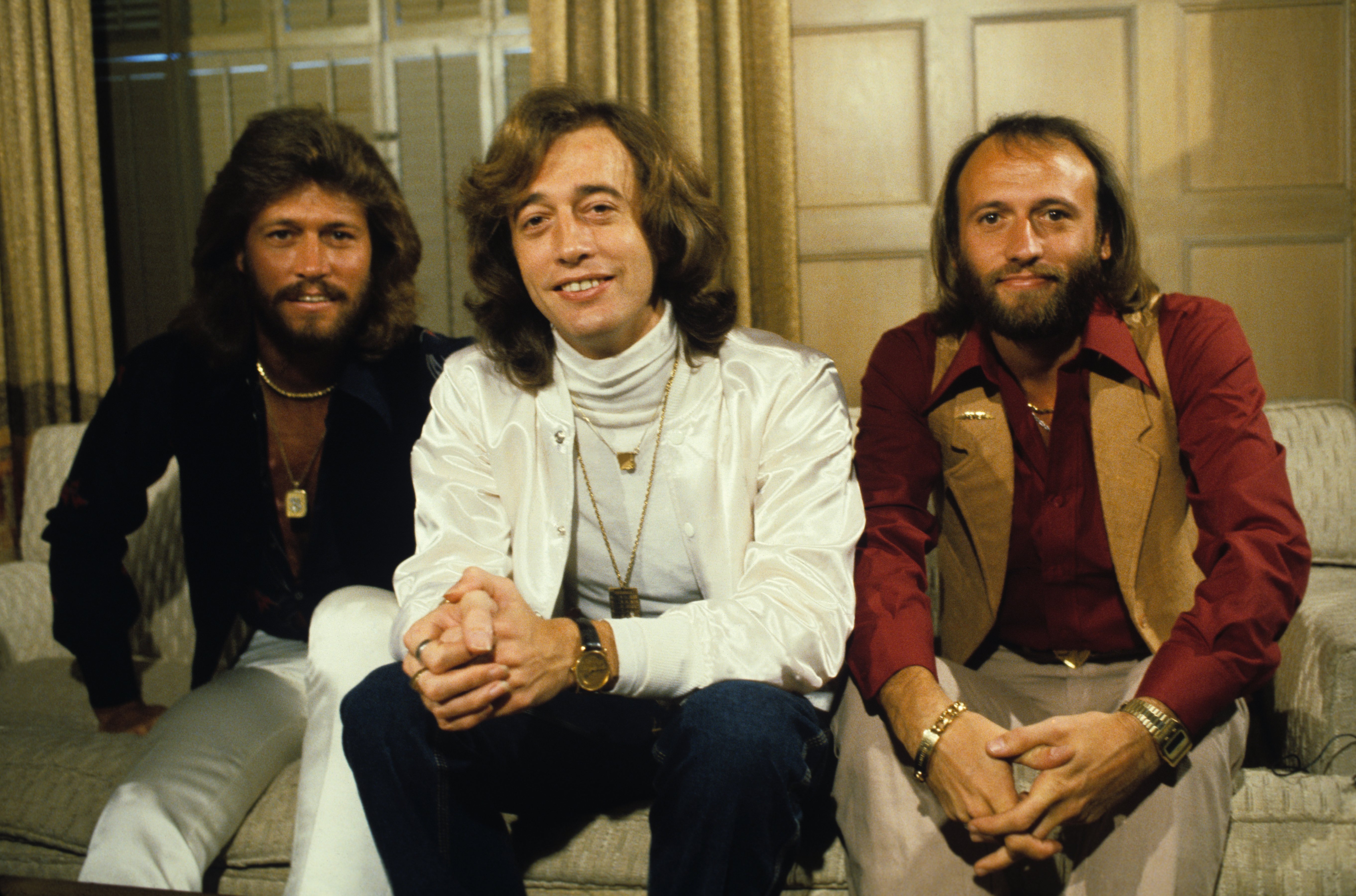 The popular disco band, The Bee Gees, pose for a portrait | Source: Getty Images