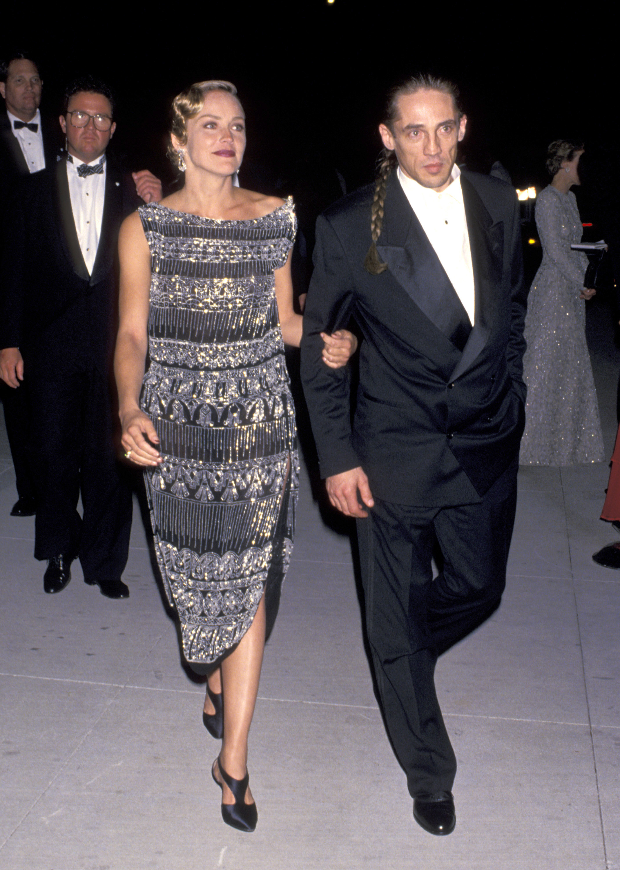 Sharon Stone arrives with her brother Michael Stone at the 1994 Vanity Fair Oscar Party in West Hollywood, California | Source: Getty Images