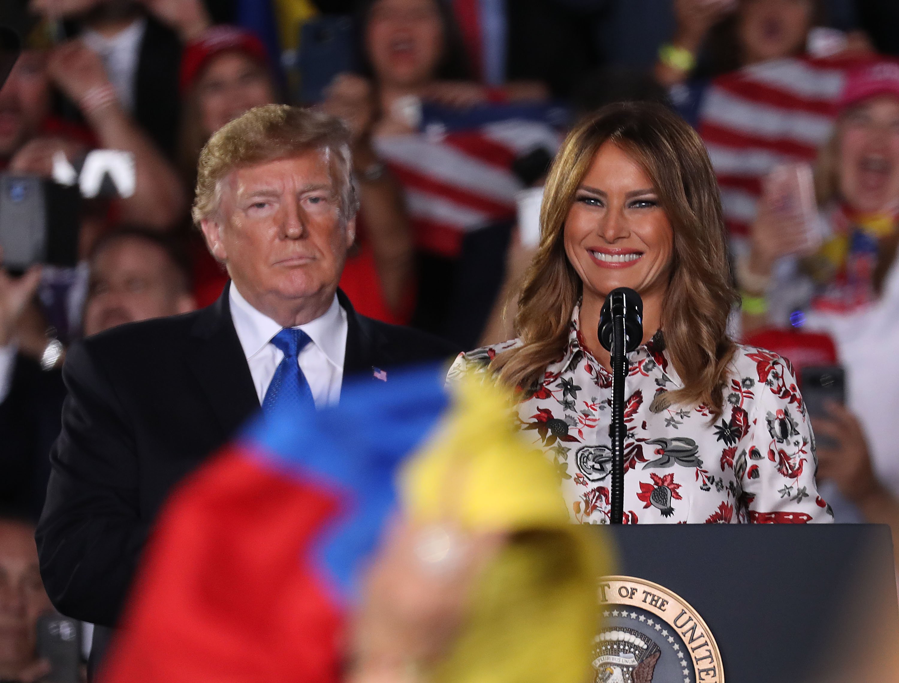 Donald Trump and Melania Trump speaking to the Venezuela American Community in February 2019 | Photo: Getty Images