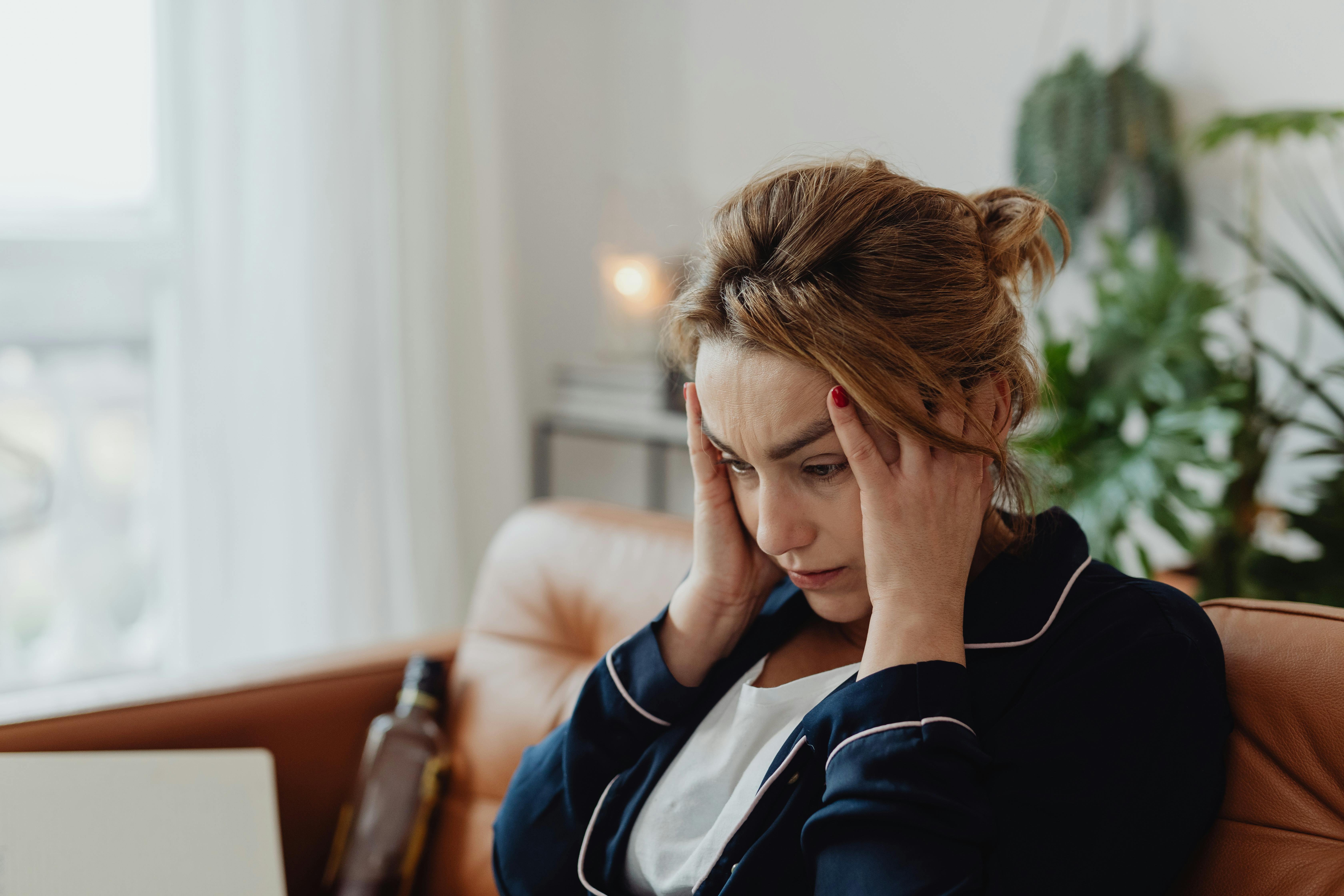 Woman with a headache | Source: Pexels