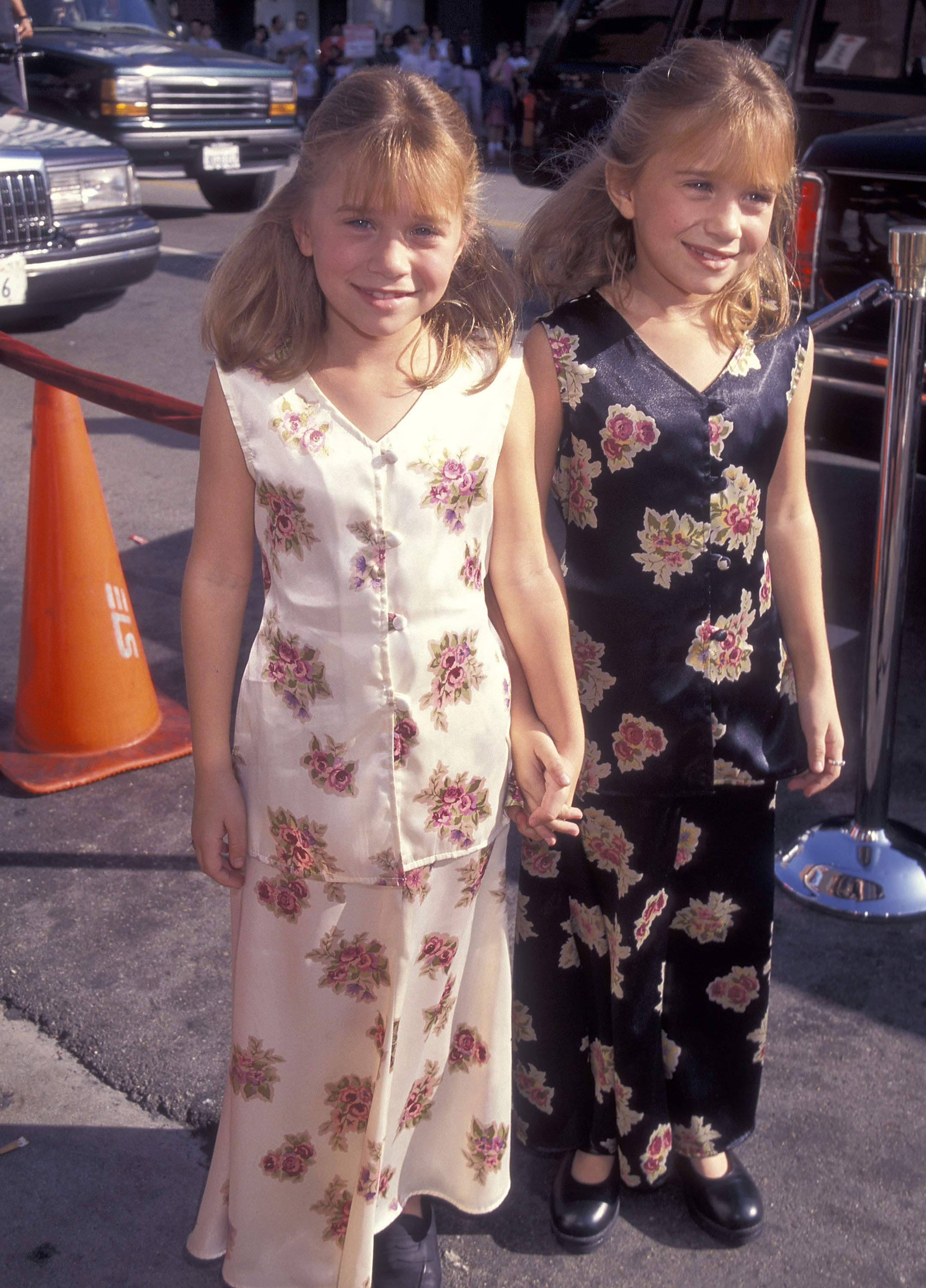 Mary-Kate and Ashley Olsen at the "It Takes Two" Westwood Premiere on November 11, 1995, in Westwood, California | Source: Getty Images