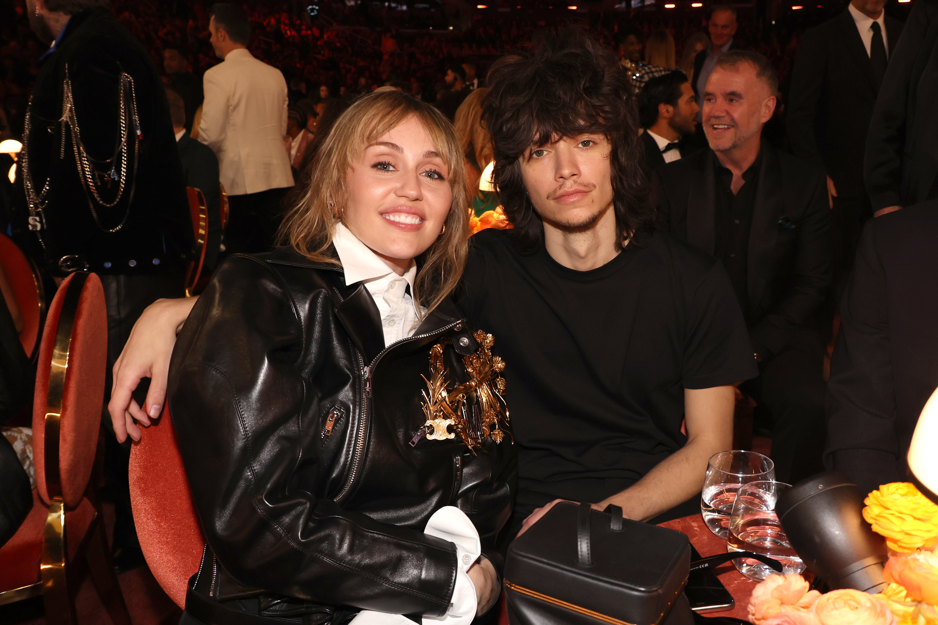 Miley Cyrus and Maxx Morando posing for a photo at the 68th Grammy Awards. | Source: Getty Images