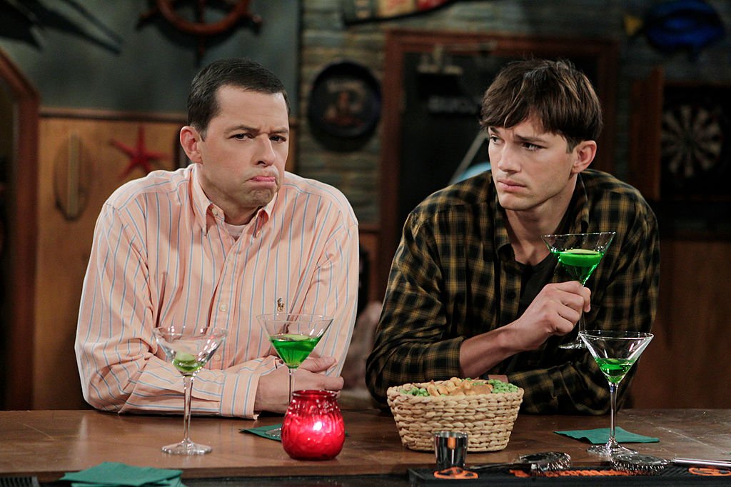 Jon Cryer as Ala) and Ashton Kutcher as Walden on an episode of "Two and a Half Men" | Source: Getty Images