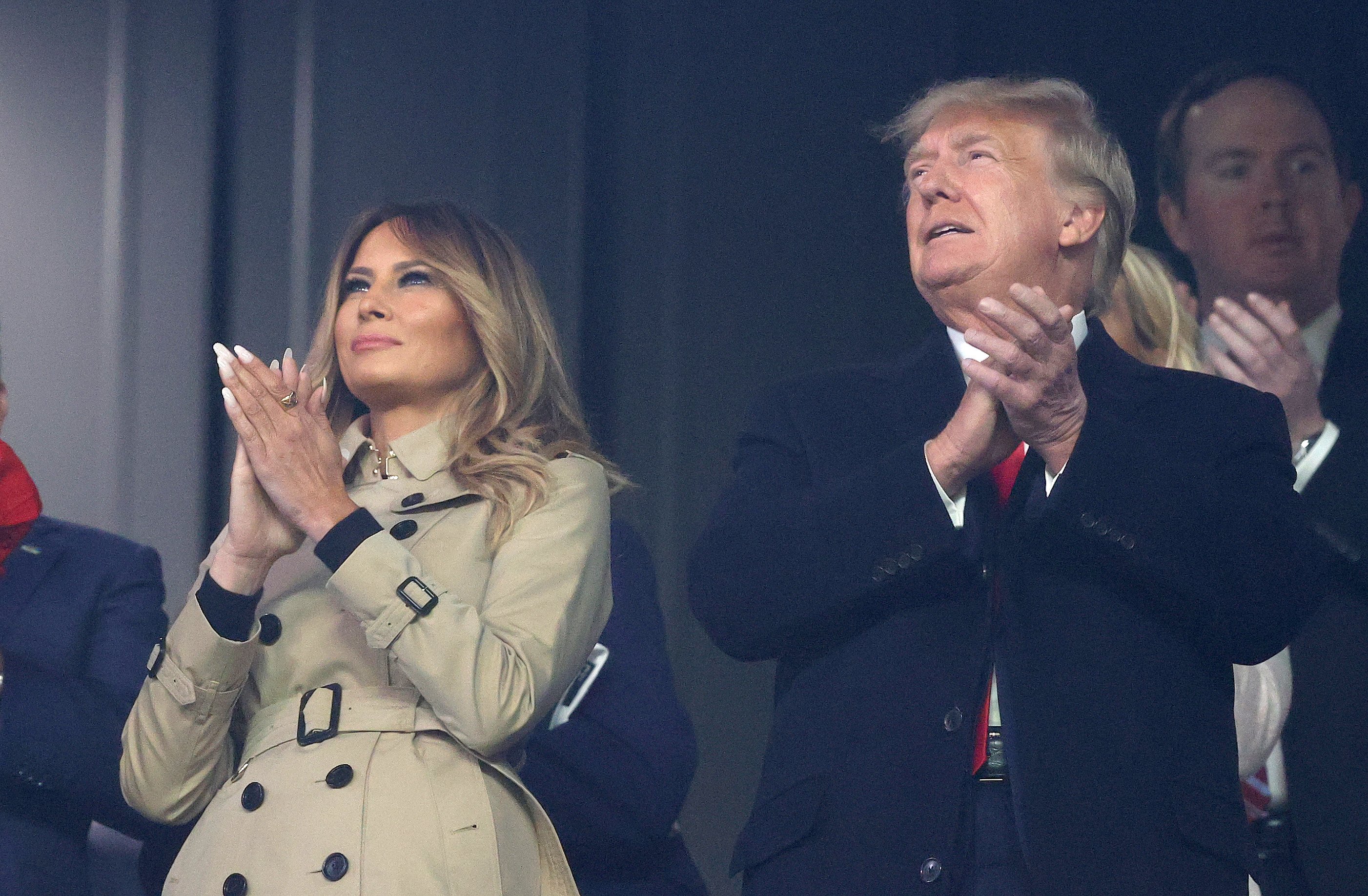 Former first lady and president of the United States Melania and Donald Trump look on prior to Game Four of the World Series between the Houston Astros and the Atlanta Braves Truist Park on October 30, 2021 in Atlanta, Georgia. | Source: Getty Images