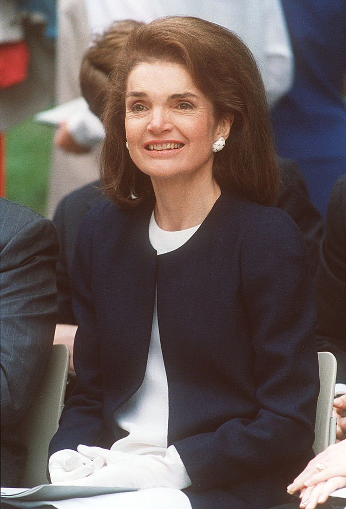 Jacqueline Kennedy Onassis during a ceremony in memory of her husband John F. Kennedy on May 29, 1990  | Source: Getty Images