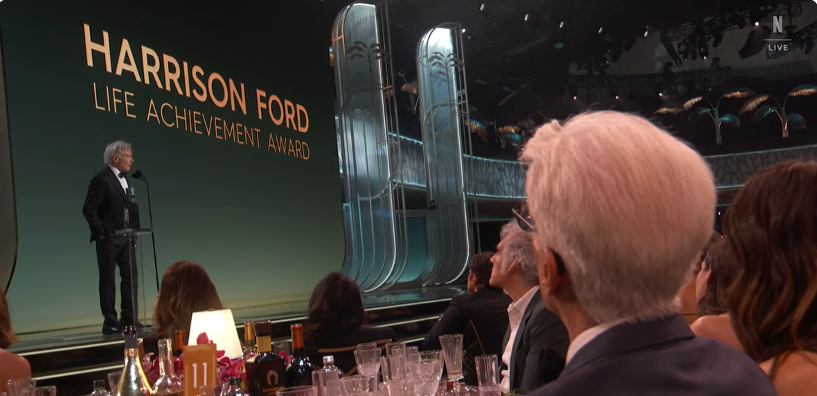 Actors in the audience listen to Harrison Ford's emotional and heartfelt speech. | Source: YouTube/Netflix