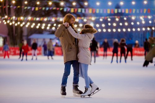 A man and woman in love skating on the ice. | Source: Shutterstock.