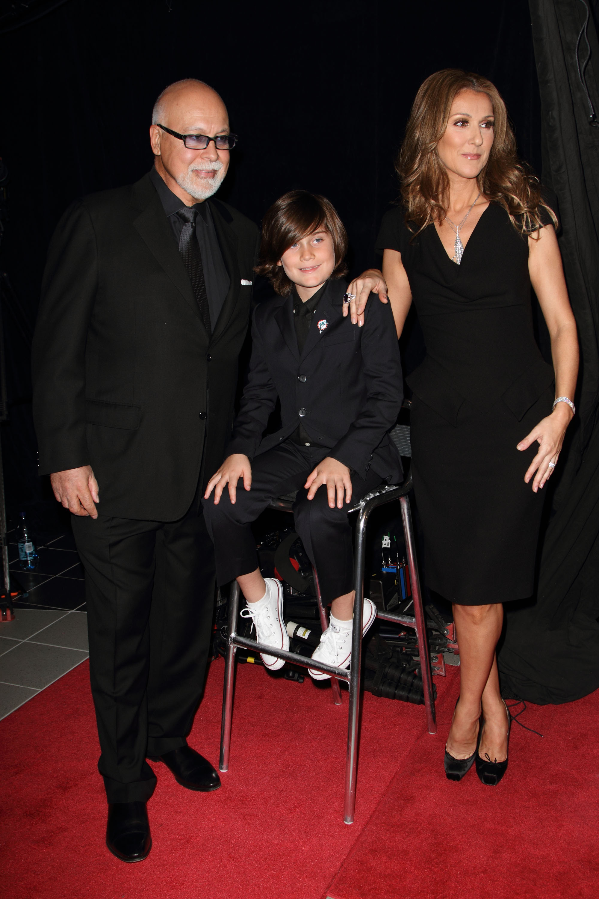 Rene Angelil, Rene-Charles Angelil and Celine Dion attend the premiere of "Celine: Through The Eyes of The World" on February 16, 2010 in Miami Beach, Florida. | Source: Getty Images