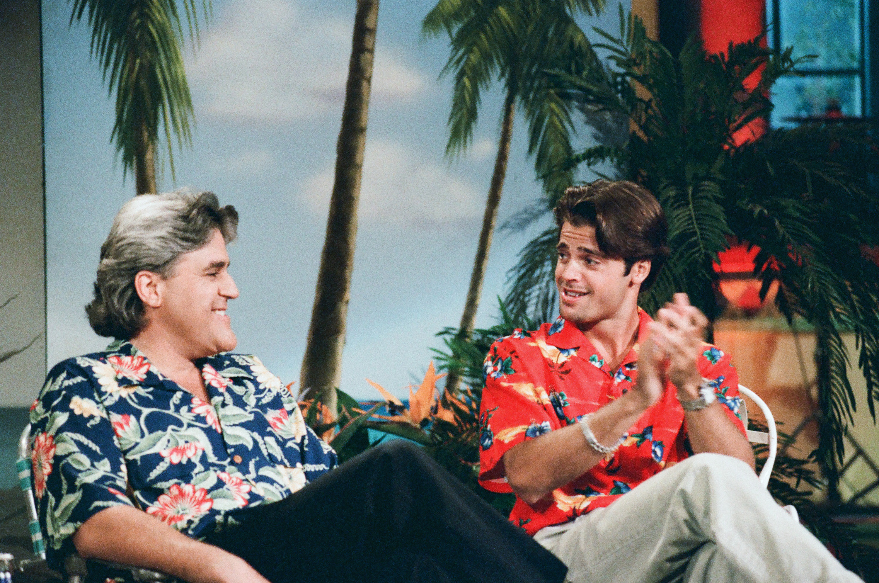 Host Jay Leno and the actor during the "Good Vacation/ Bad Vacation" sketch on June 11, 1996 | Source: Getty Images