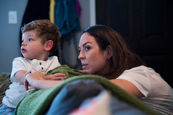 A young mother and her child pictured together in a room | Photo: Getty Images