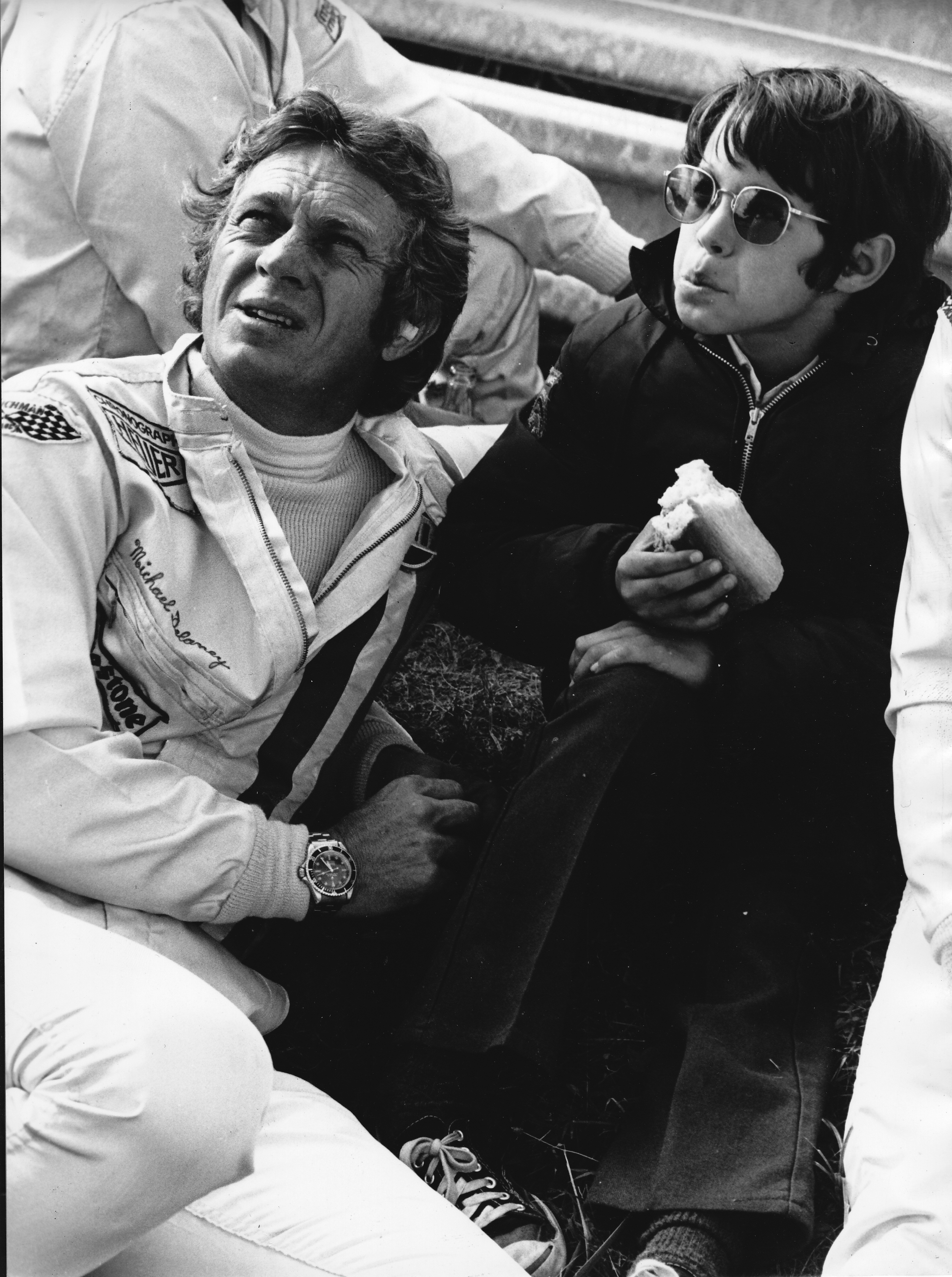 Actor Steve McQueen relaxes with his son Chad McQueen as he stars in the movie 'Le Mans' on June 24, 1971, in Le Mans, France. | Source: Getty Images