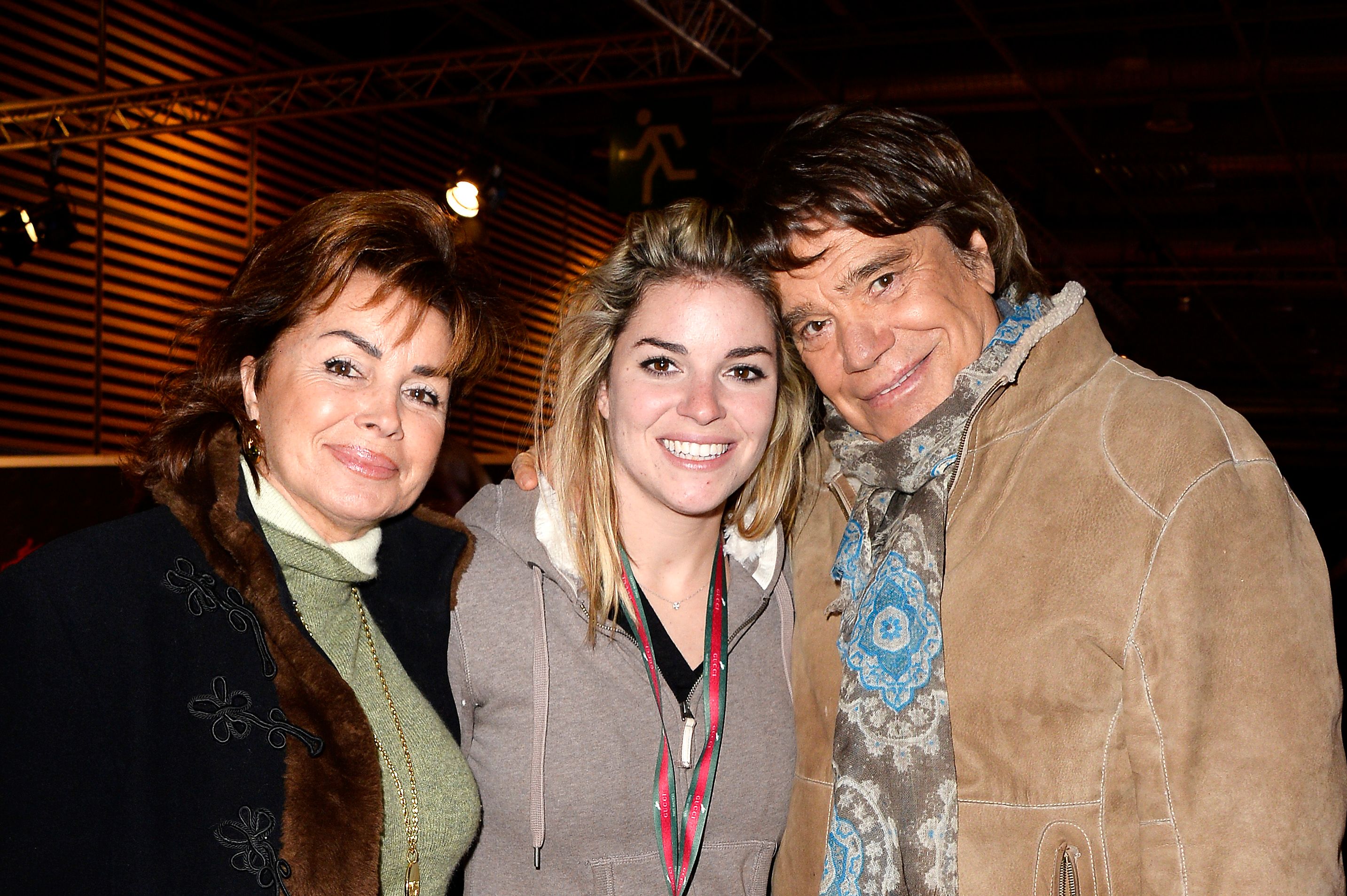 Dominique Tapie, Sophie Tapie et Bernard Tapie assistent au Gucci Paris Masters 2013 le 7 décembre 2013 à Paris, en France. | Photo : Getty Images