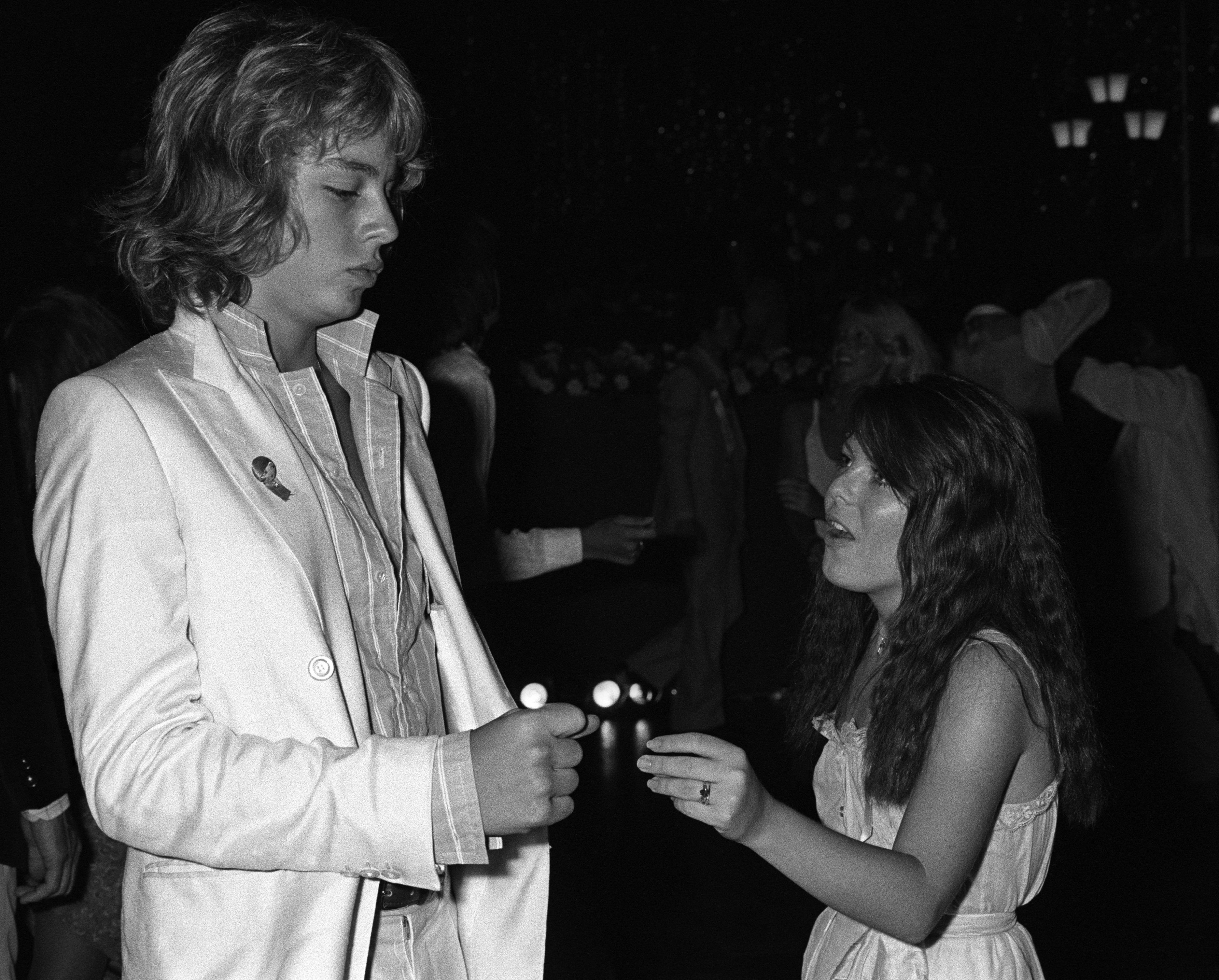 Leif Garrett and his sister Dawn Lyn dance at a party at the Playboy Mansion in Los Angeles, California in 1970 | Source: Getty Images